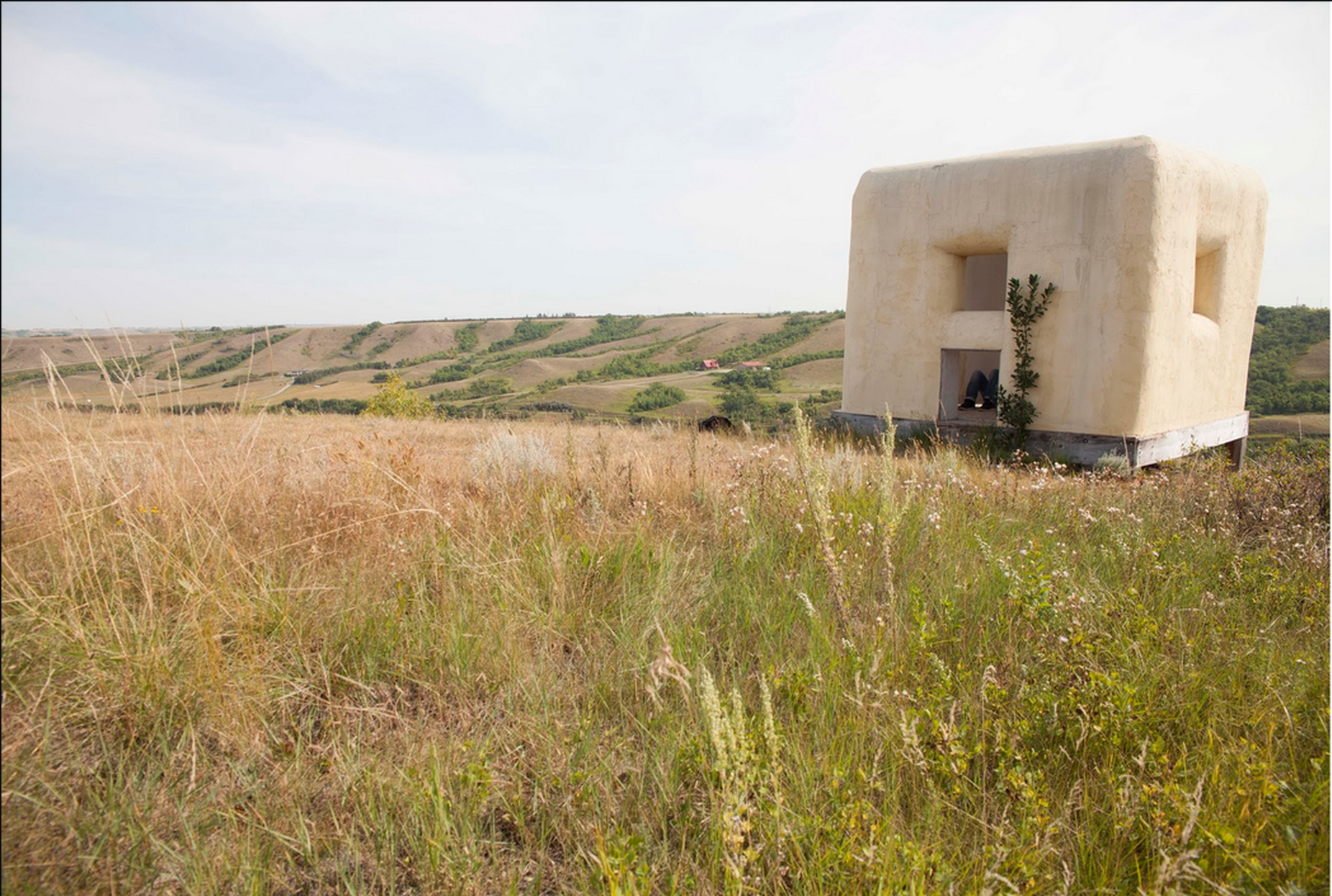 Participant Rick Moody in the Straw Bale Observatory built by Dennis Evans in Saskatchewan, Canada. Photograph by Ayden L. M. Grout