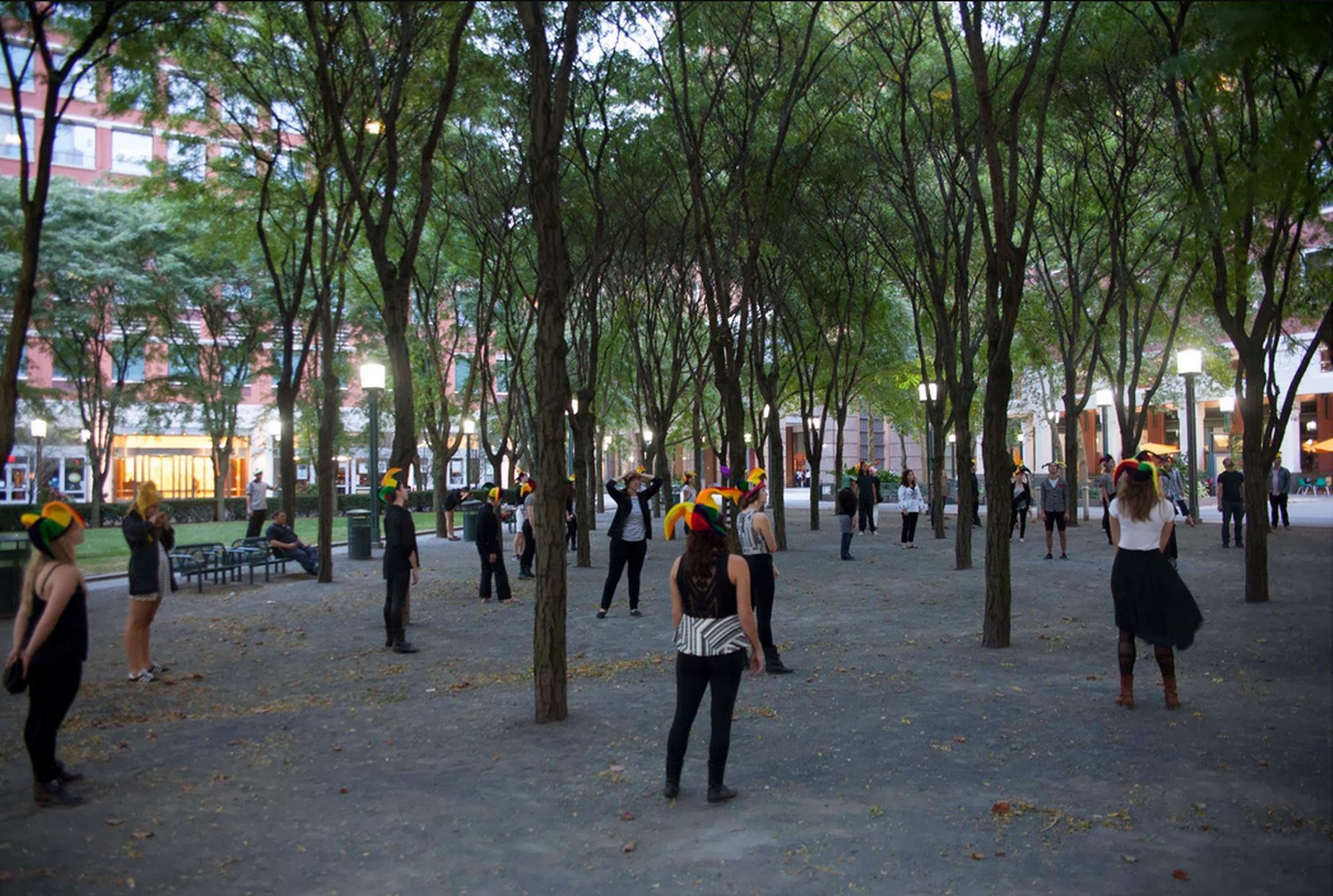 Nearly one hundred complete strangers and members of the public convening at Metrotech Plaza for the climax of the penultimate day of "When I Left the House it Was Still Dark" in New York City, in 2013. Photograph by Ayden L. M. Grout