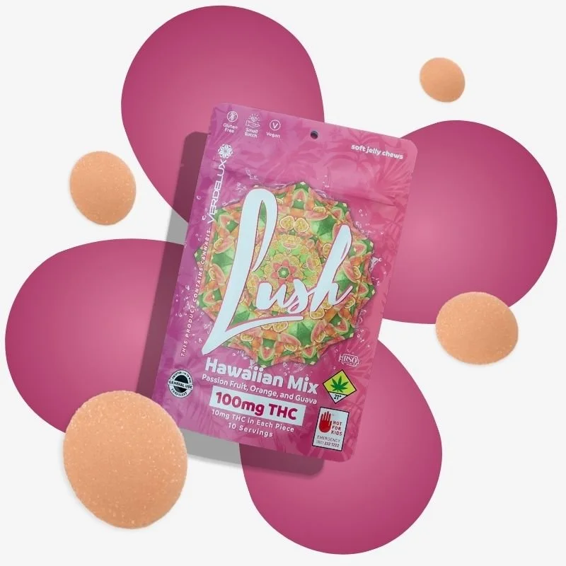 Package of Lush Hawaiian Mix soft jellies with passion fruit, orange, and guava flavor; surrounded by pink circles and peach-colored gummies.