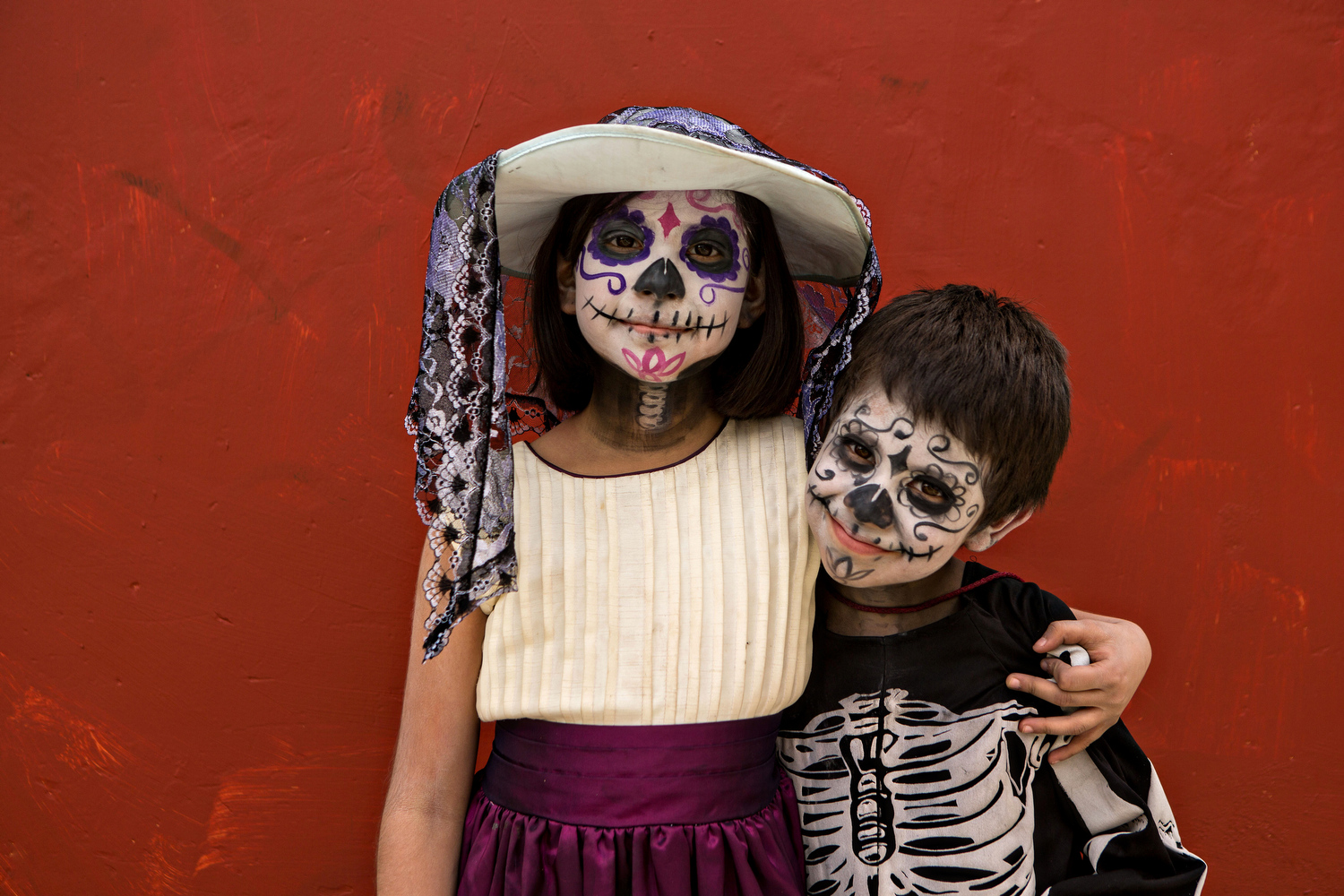  Young Mexican children dressed in costumes smile during the Day of the Dead Festival known in spanish as Dia de Muertos on November 1, 2013 in Oaxaca, Mexico. 