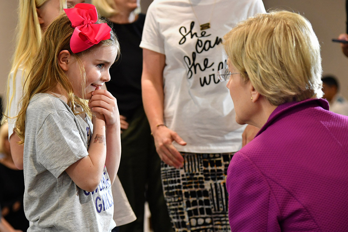  Democratic presidential hopeful Sen. Elizabeth Warren chats with a young girl following the Coastal Community Forum April 15, 2019 in Charleston, South Carolina.  