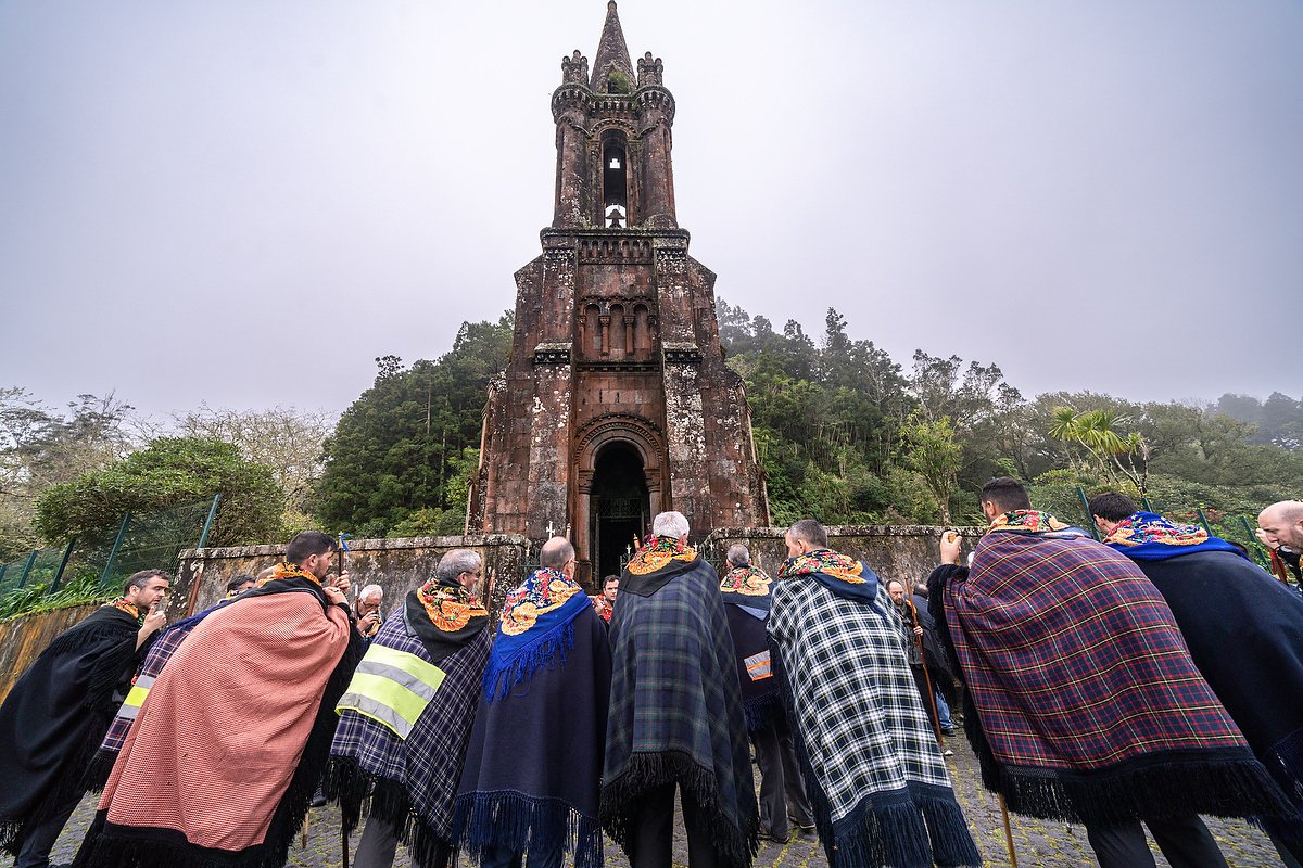  Roman Catholic pilgrims called a Romeiros, gather outside the Our Lady of Victories Chapel in mist and rain during their 8-day trek around the Azorean Island of Sao Miguel, March 30, 2023 in Furnãs, Portugal. The pilgrims visit 100 shrines and churc