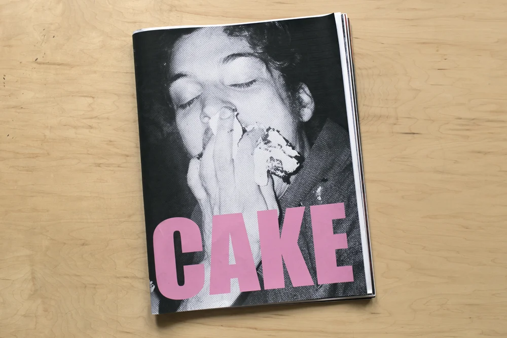 The cover of Caitlin's newly released zine, "Cake," which features photos from The Districts / Sun Club fall US tour.