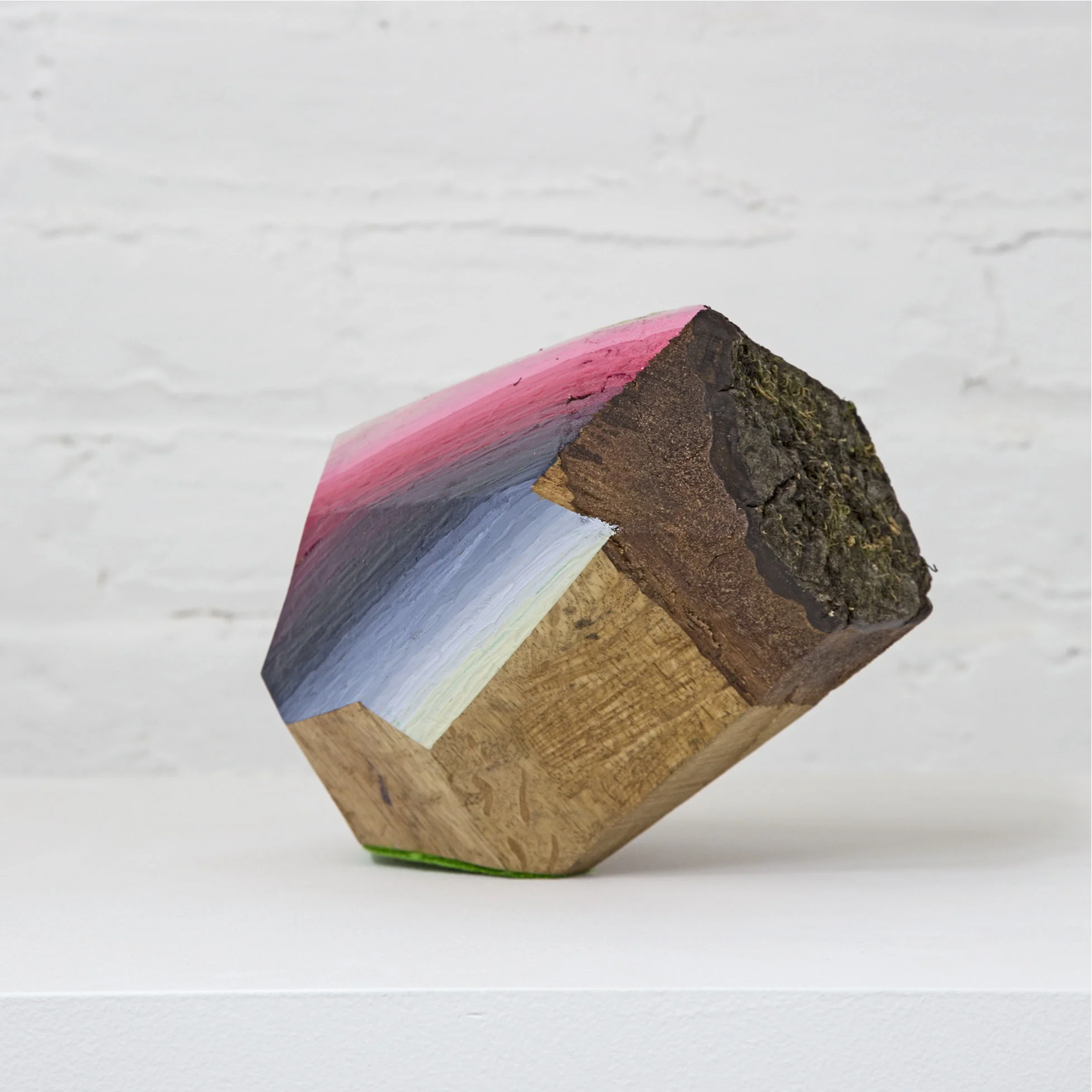 Woodrock (flake gray to cartoon pink with moss and bark retained)