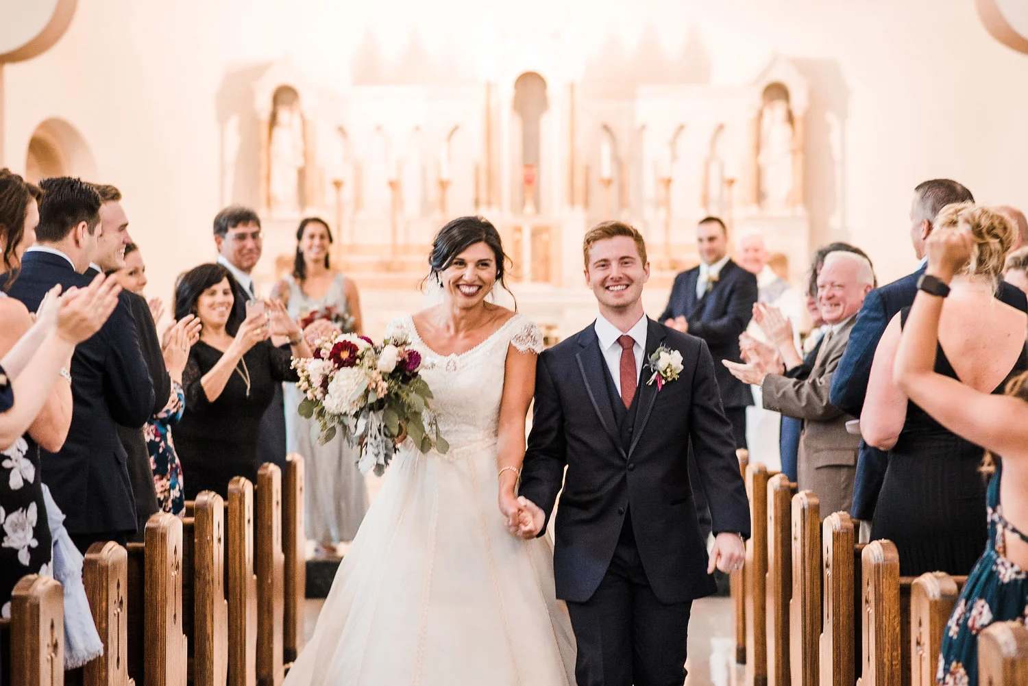 Bride+and+groom+walk+down+aisle.jpeg