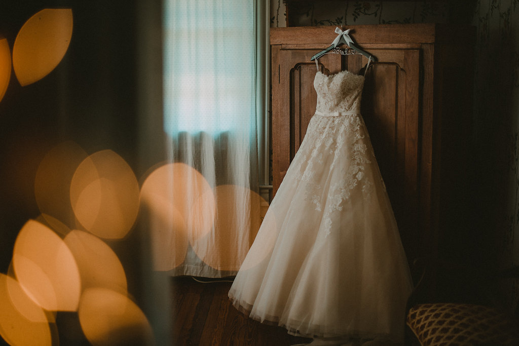 Wedding+dress+hanging+on+a+wardrobe.jpeg