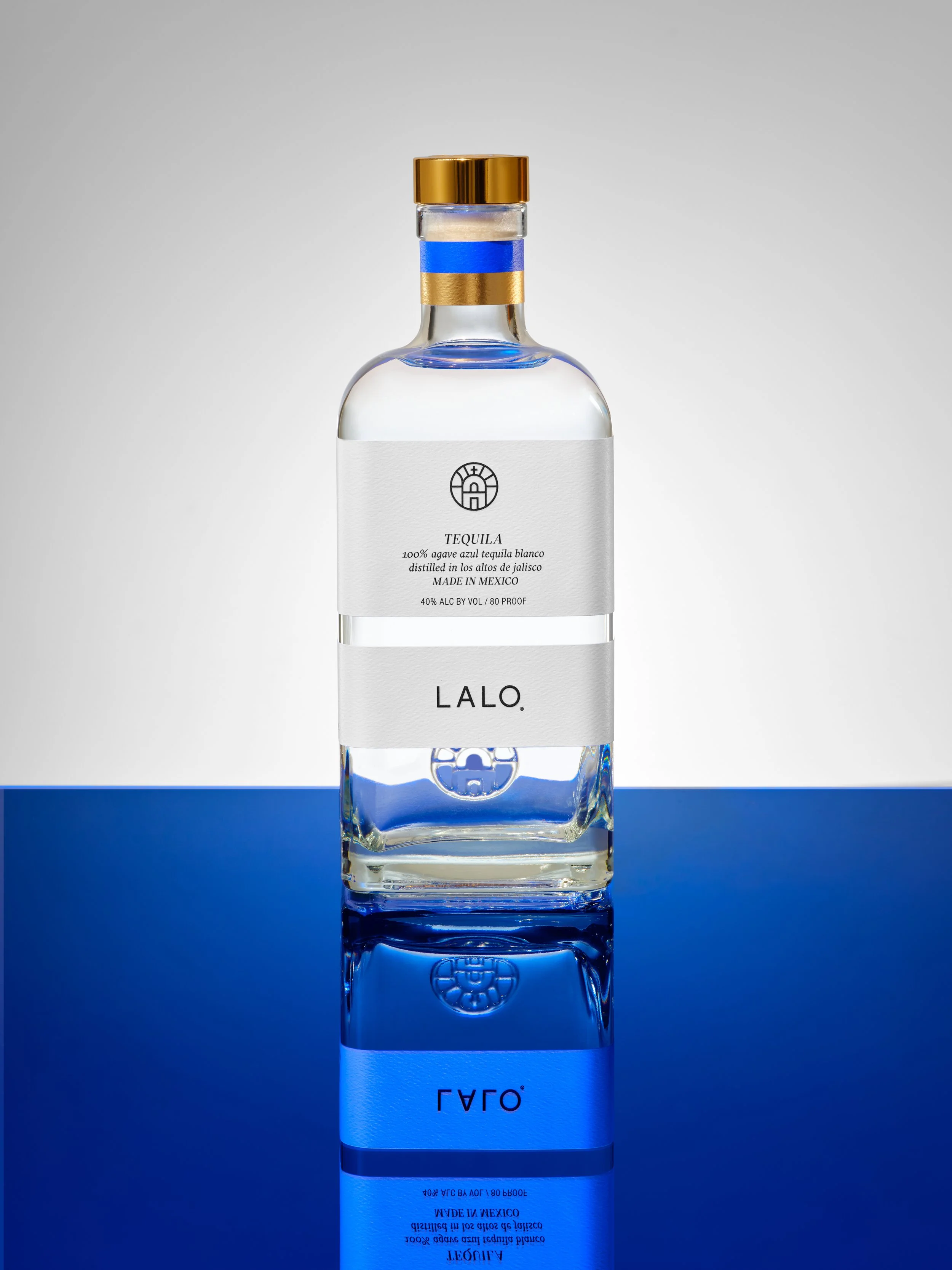 Lalo_10_17_24_Bottle on Blue_Hero_001.jpg