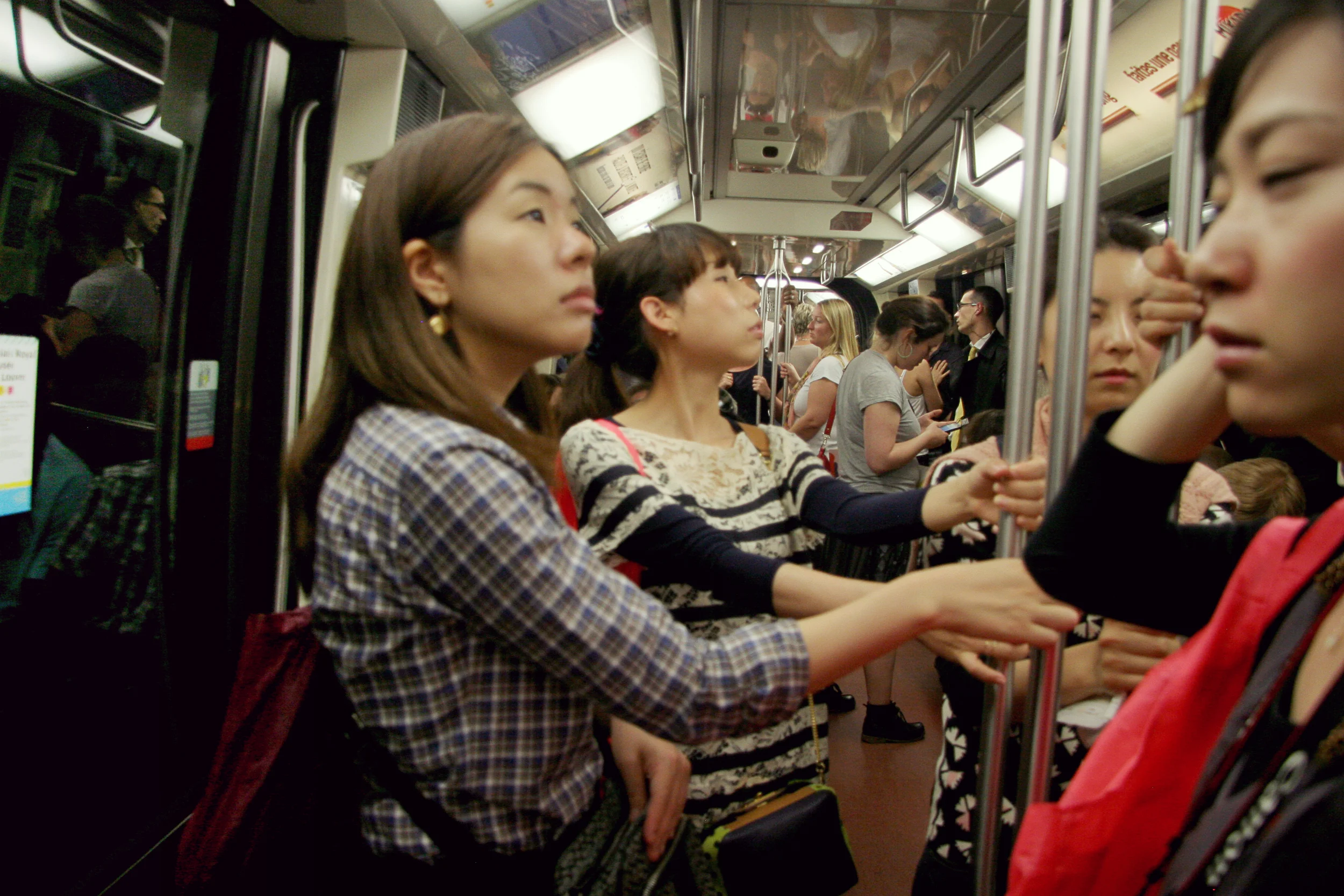 These beautiful Asian girls from the Metro (I was so close to asking them if I could take a picture of them when we got off the subway, but they walked too fast :)