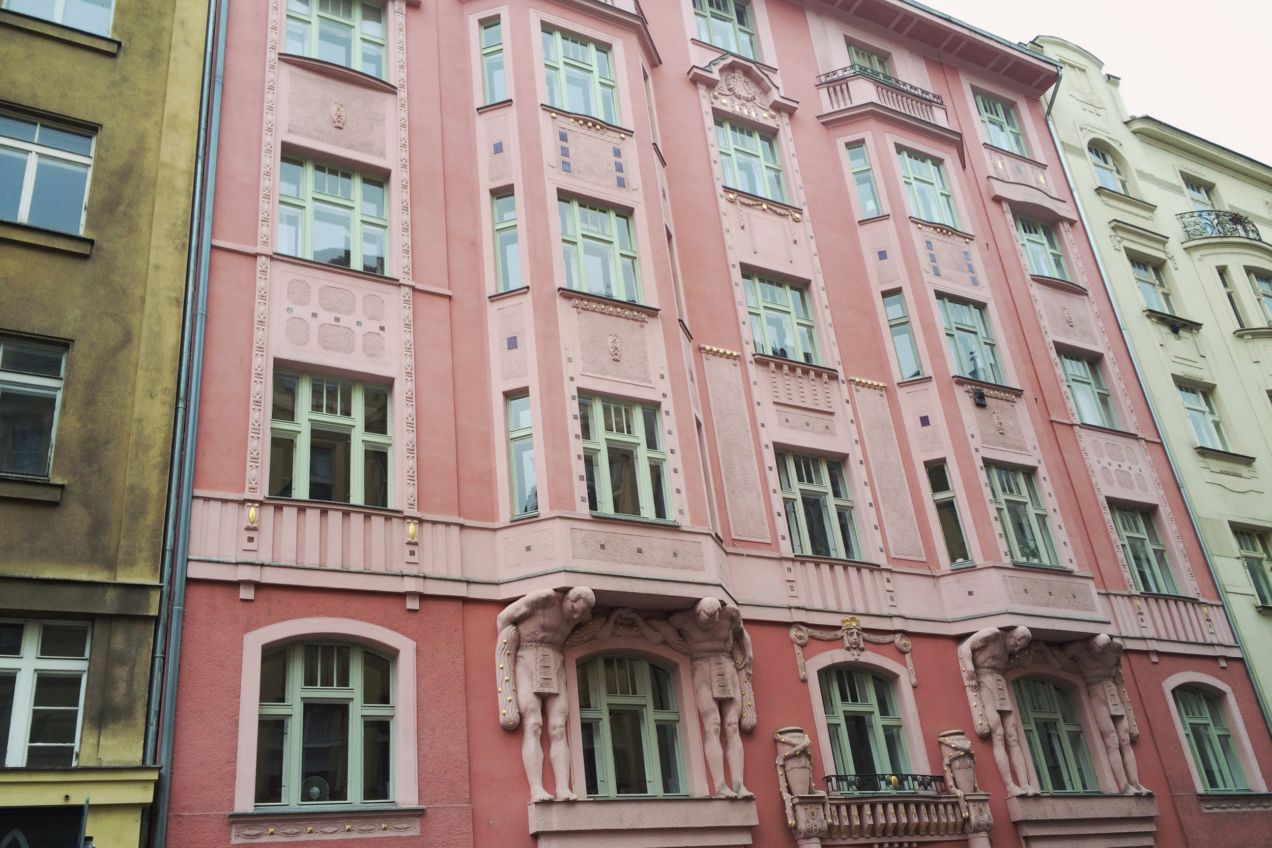 I thought these guys holding up the windows looked a little tired... and it's funny that they are pink :)