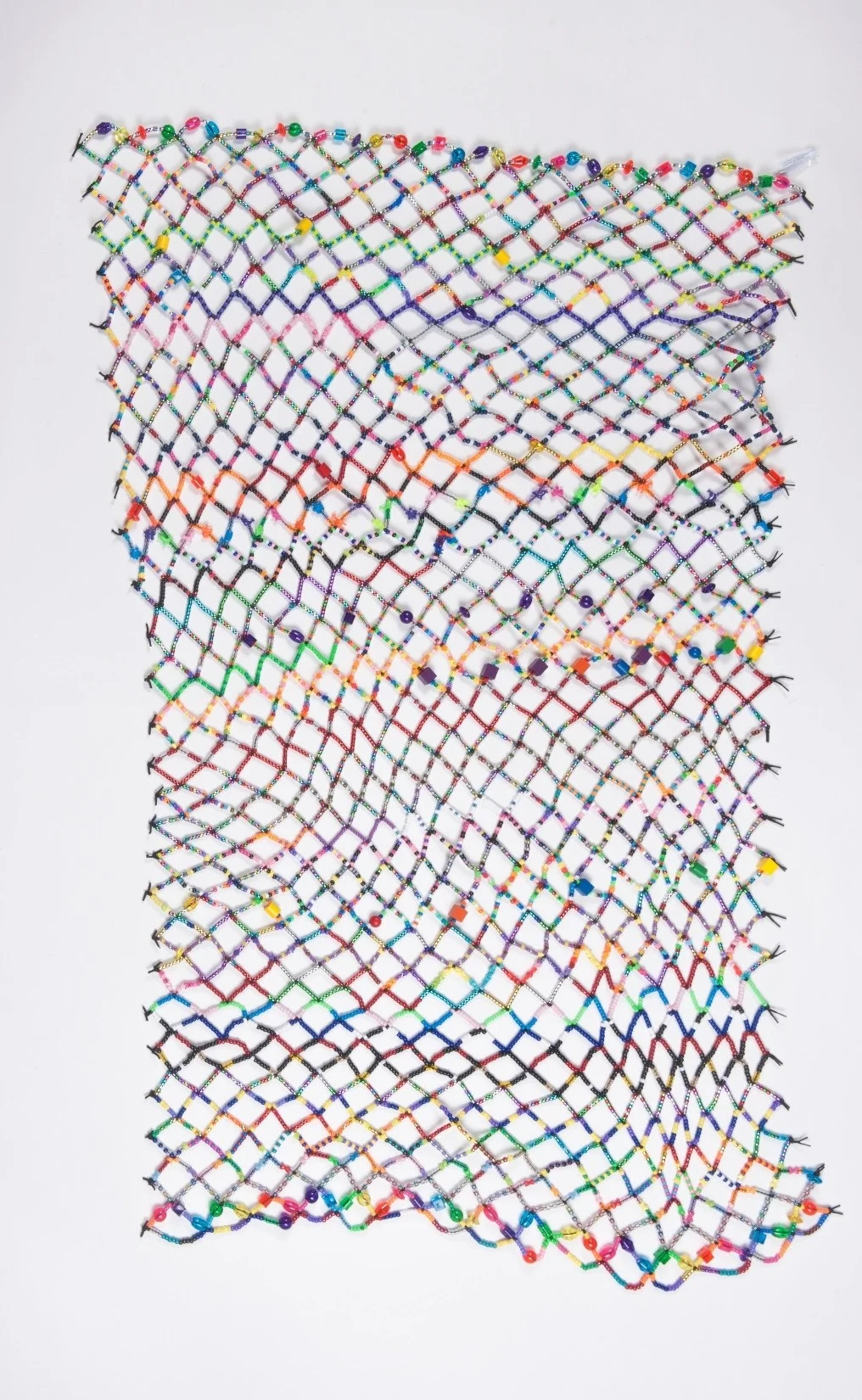 #12 - Bead-a-Thon Christine Cox-Hayes, Kathryn Usher and Nadine Charity. Several bead-a-thons were held during the months of the Nick Cave “As Is” residency. This blanket was partially crafted during one of those events.