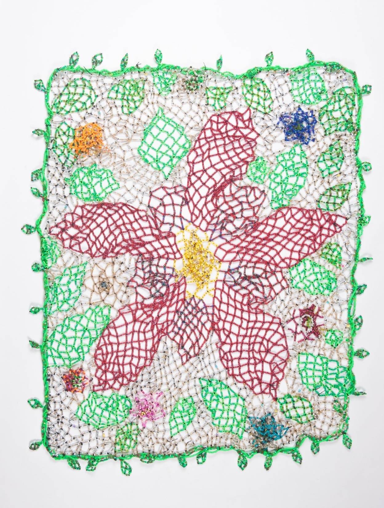 #19 - Grandmothers Garden Sherry Tamburo and Heather Beauvais This blanket was inspired by the stories that were told by several of the residents during our beading sessions. It became apparent that Grandmothers play a significant part in shaping our lives.