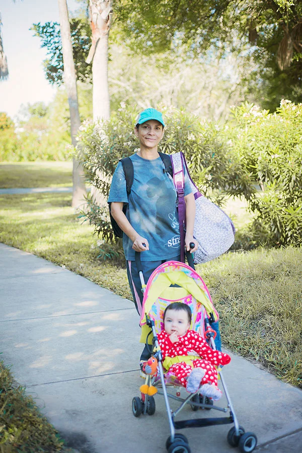 My momma, cruising the pathways of the Hilltop Gardens with Abby while I work.