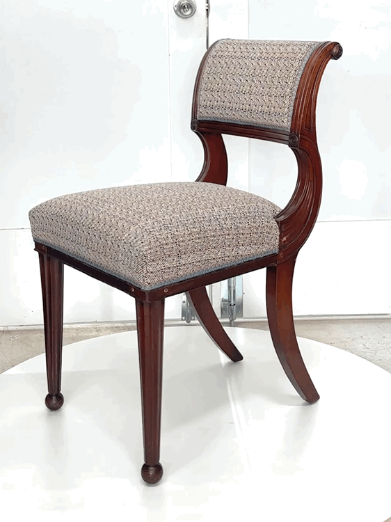 Carlton-Regency-Dining-Chair-English-style-upholstered-sabre-form-rear legs-turned-tapered-curved-carved-back-rosettes-victoria-&-son-custom-bespoke-funiture-dining-desk-made-to-order-com-trim.GIF