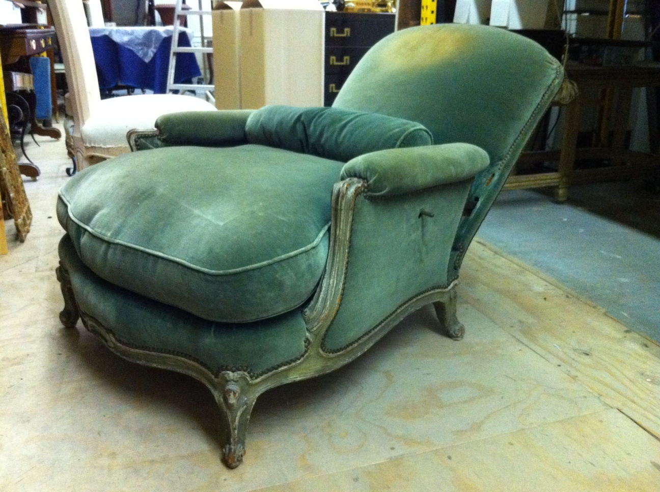 An original style Barroux in reclined position. One of the mechanical levers is underneath the arm. 