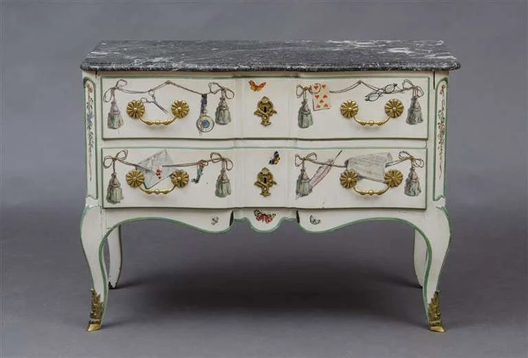 A Trompe L'Oeil painted commode by Maison Jansen, featured in “Jansen Furniture” by James Archer Abbott, page 252, and seems to show Fernand Renard's style of painting.