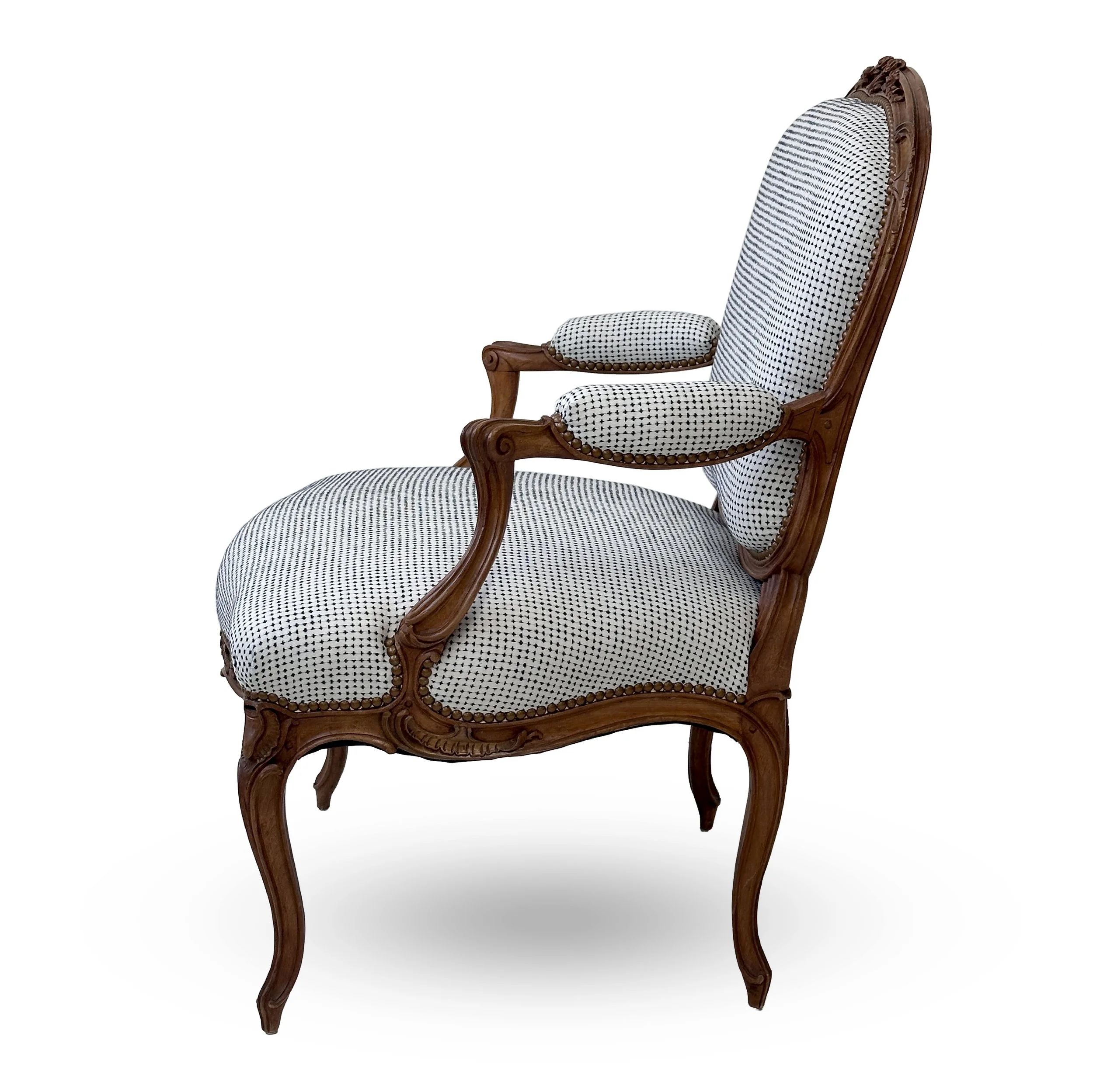 R133-St.-Georges-model-finely-carved-Louis-XV-open-arm-chair-carved-floral-details-and-graceful-curved-silhouettes-Victoria-&-Son-upholstered-Nail-head-trim.jpg