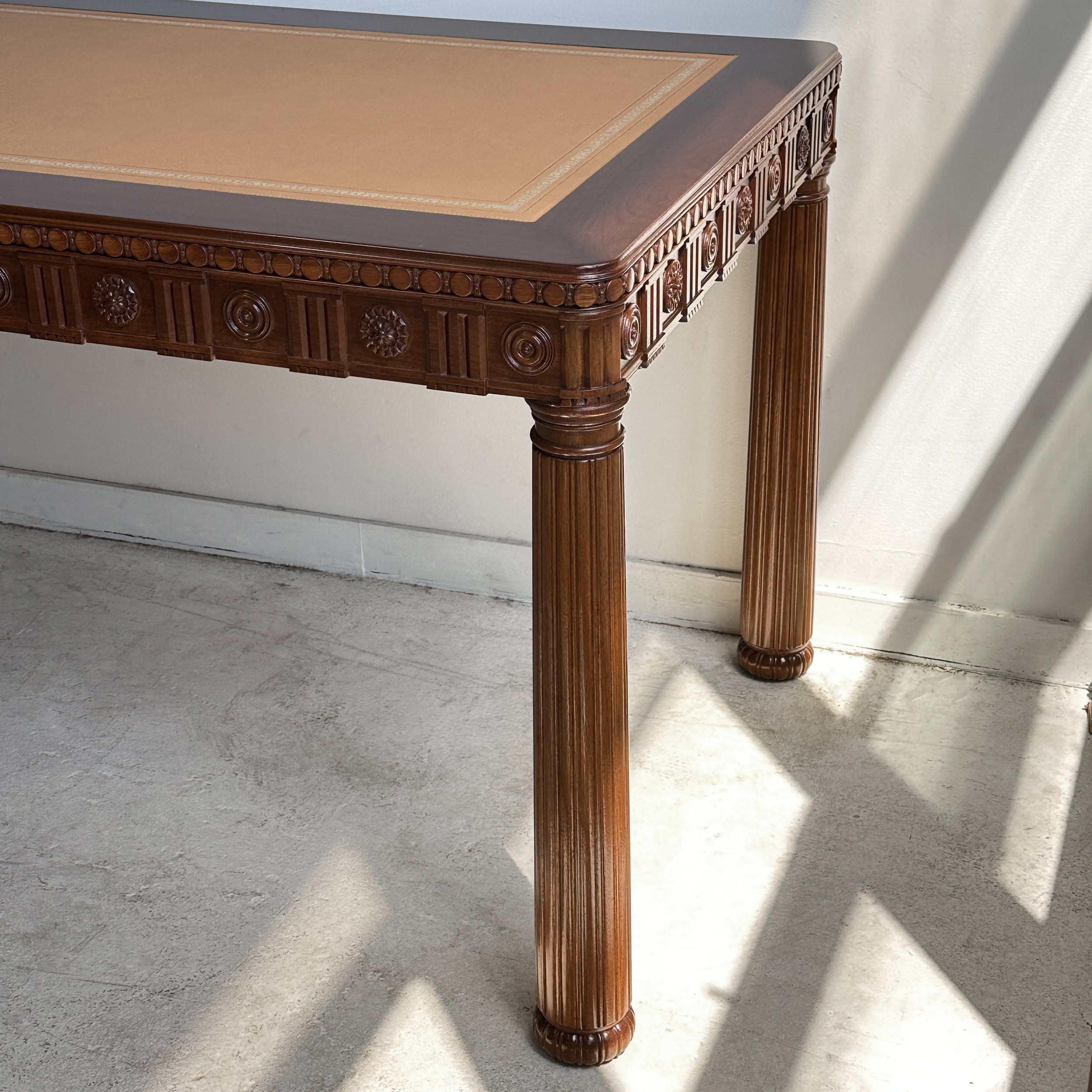 George-III-Style-Writing-Table-mahogany-hand-carved-neoclassical-decorative-motifs-tapering-legs-reeded-drawer-pattern-solid-high-relief-Victoria-&-Son.jpg
