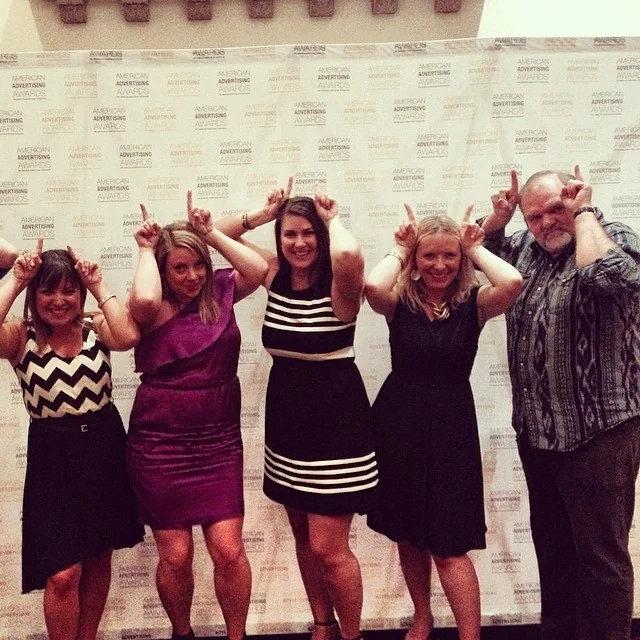 AAF Seattle board members show their District XI spirit. (L-R) Audrey Berglund (ADDYs), Kirsten Martin (Sponsorship), Renee Peterson (President), Christine Gammill (District XI Governor), and Martin McGee (VP/Treasurer).