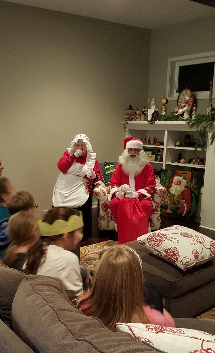 Santa & Mrs. Claus are about to hand out gifts to good children!
