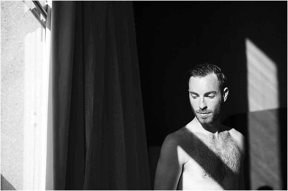 sexy dudeoir portrait with direct sunlight through the window