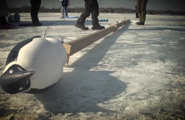 this is a picture of a penguin tower we constructed out of paper tubes once. We wanted to have the tallest structure on the lake, winter 2008, outside Minneapolis, MN. It worked.