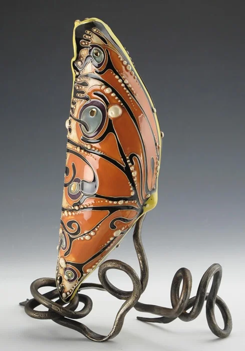 "Chrysalis", 9"w x 12"h. Ceramic by Carol Long, forged steel by Dustin Sypher 