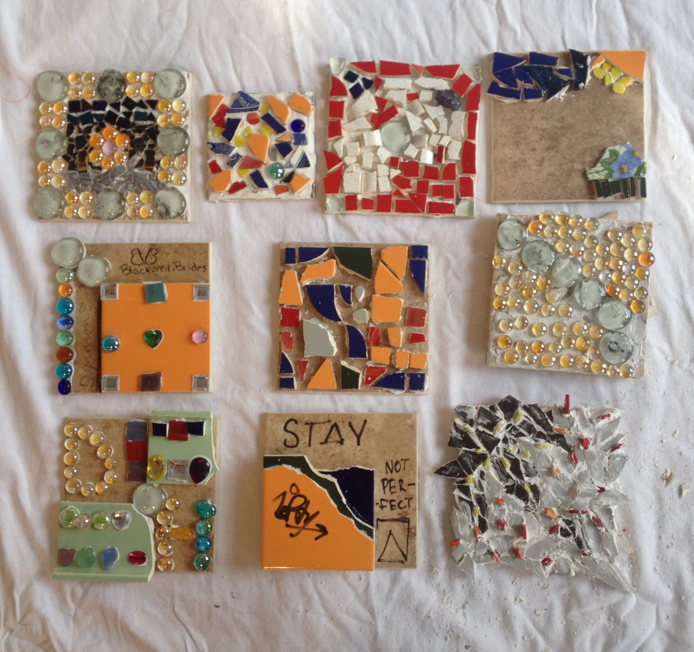 There's so much personality in each and every one of these pieces. Johannah described the technique of stacking tesserae or mosaic pieces, and several put this idea to good use in their work.