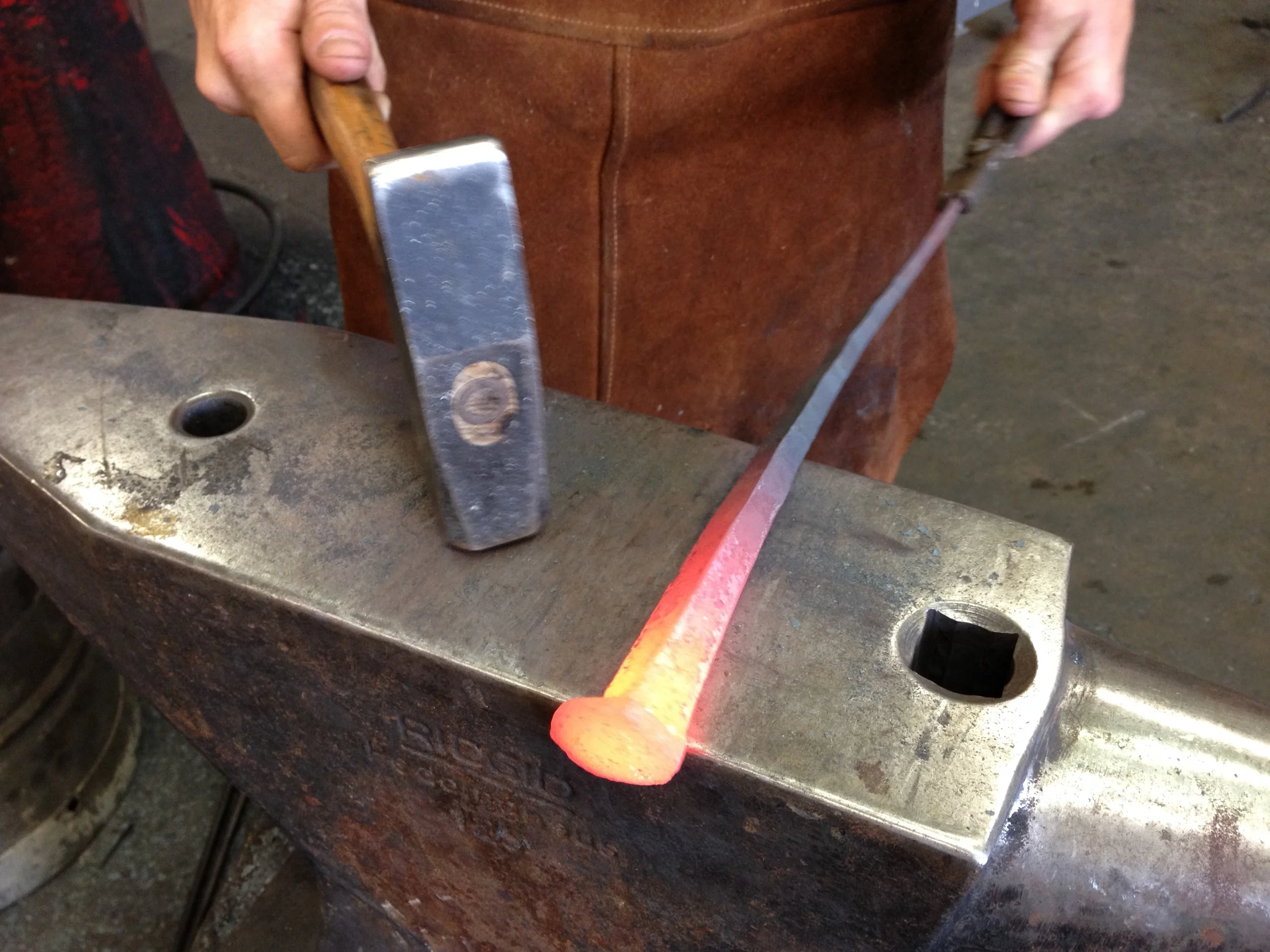 Forging a railroad spike hook