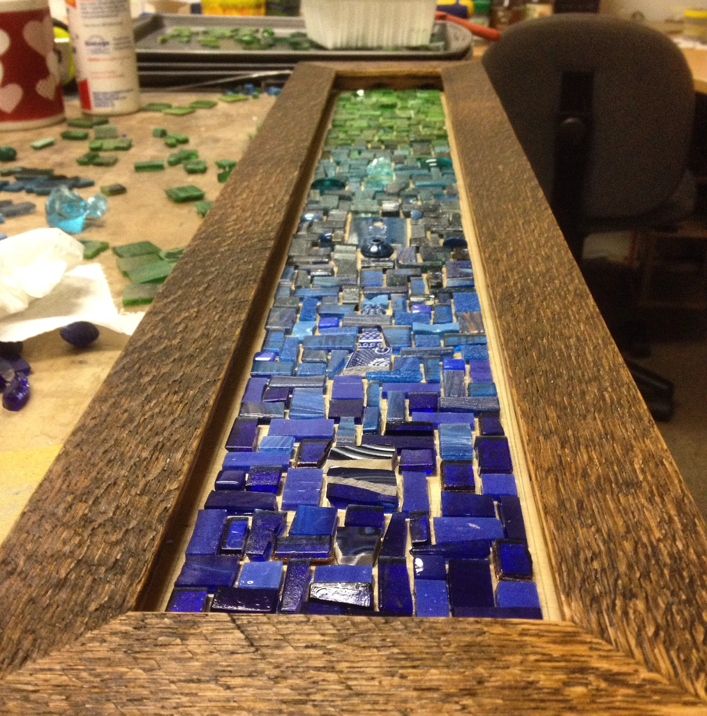 Custom six hook mosaic coat rack in blue and green in the mosaic studio