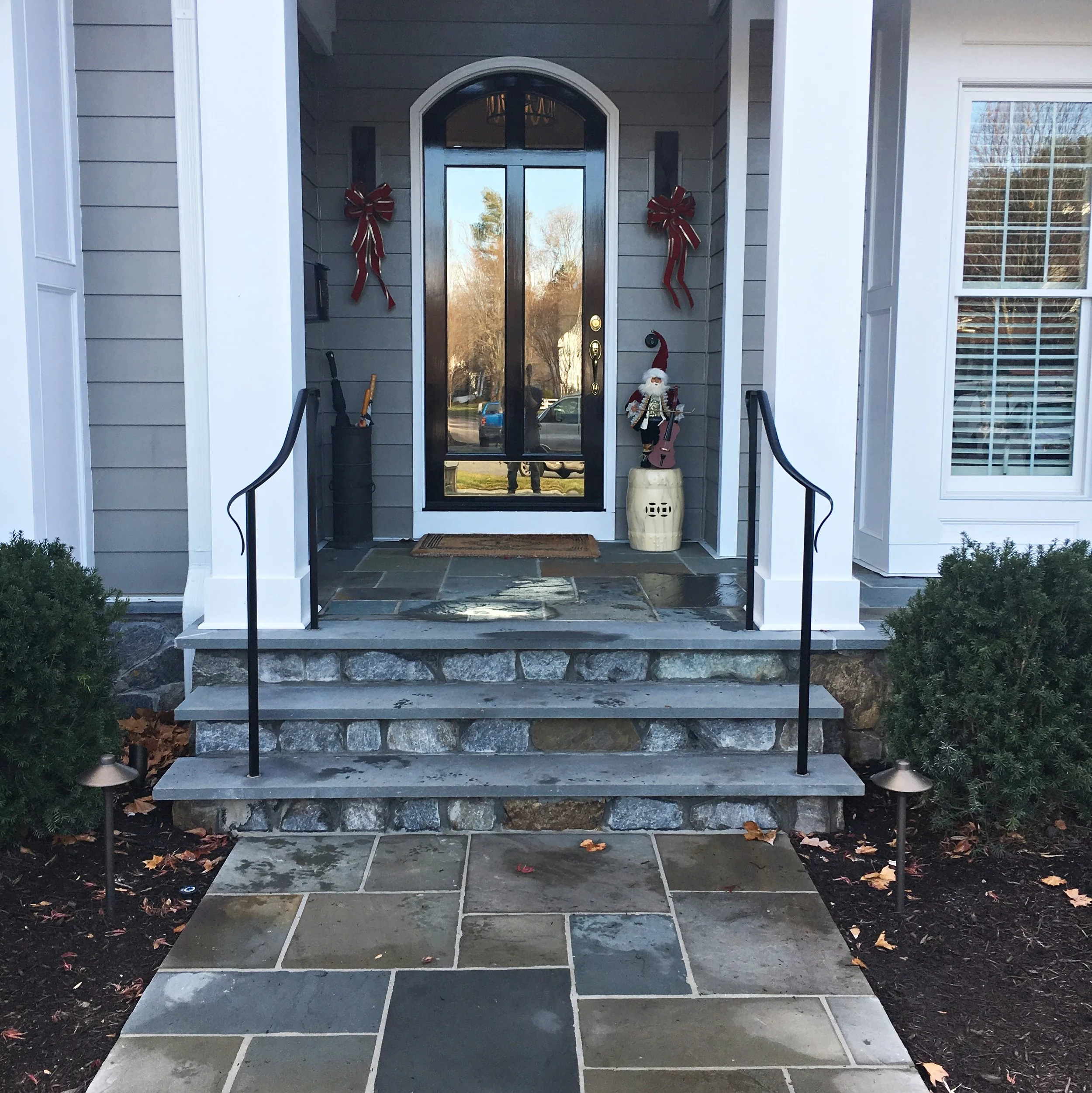 Two sets of exterior hand railings