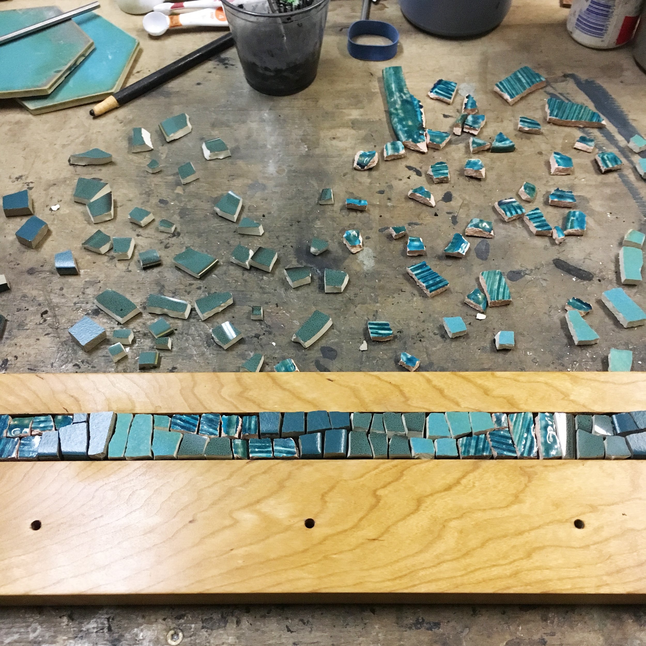 Teal mosaic in process
