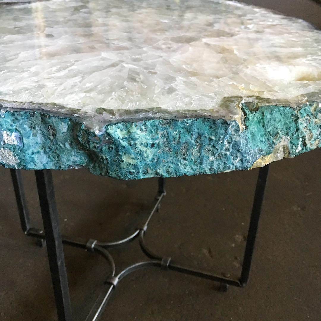 Detail of stone top on customu steel table base