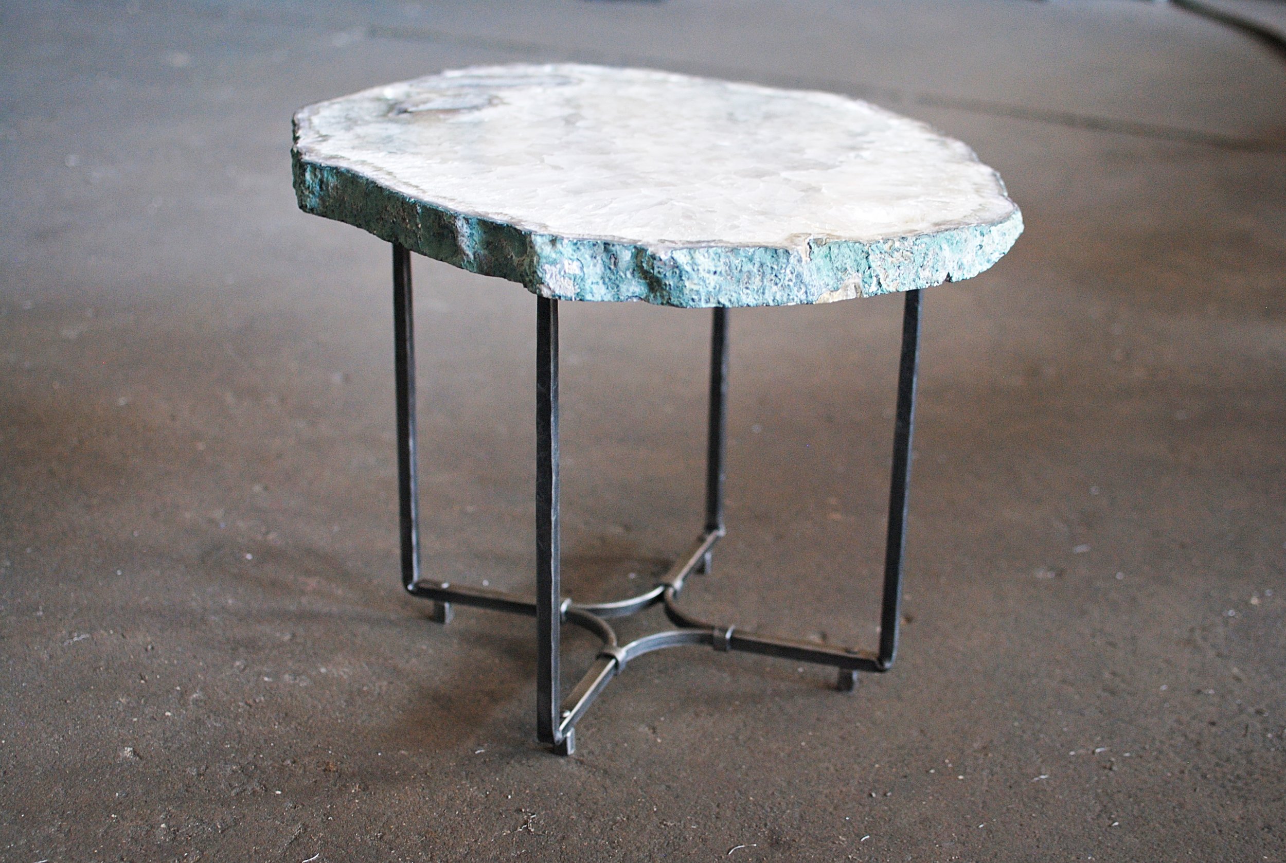 Custom steel table base with stone top