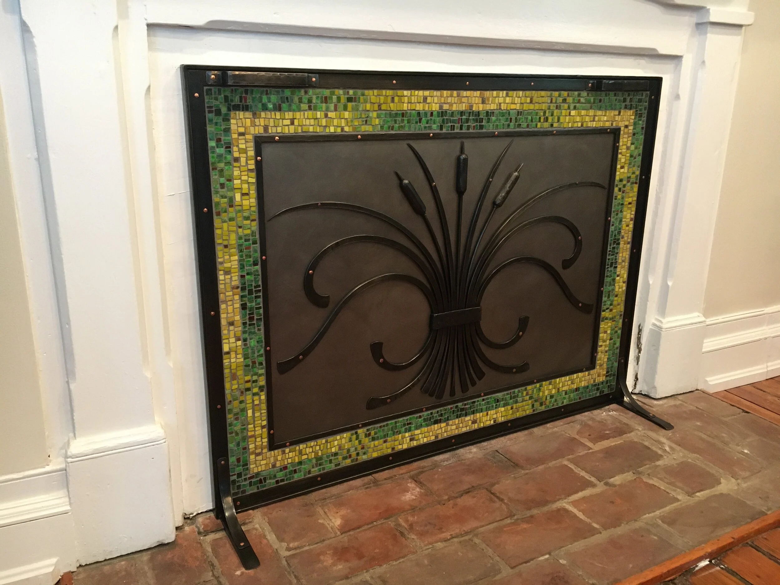 Forged Steel and Mosaic Fireplace Cover Collaborations