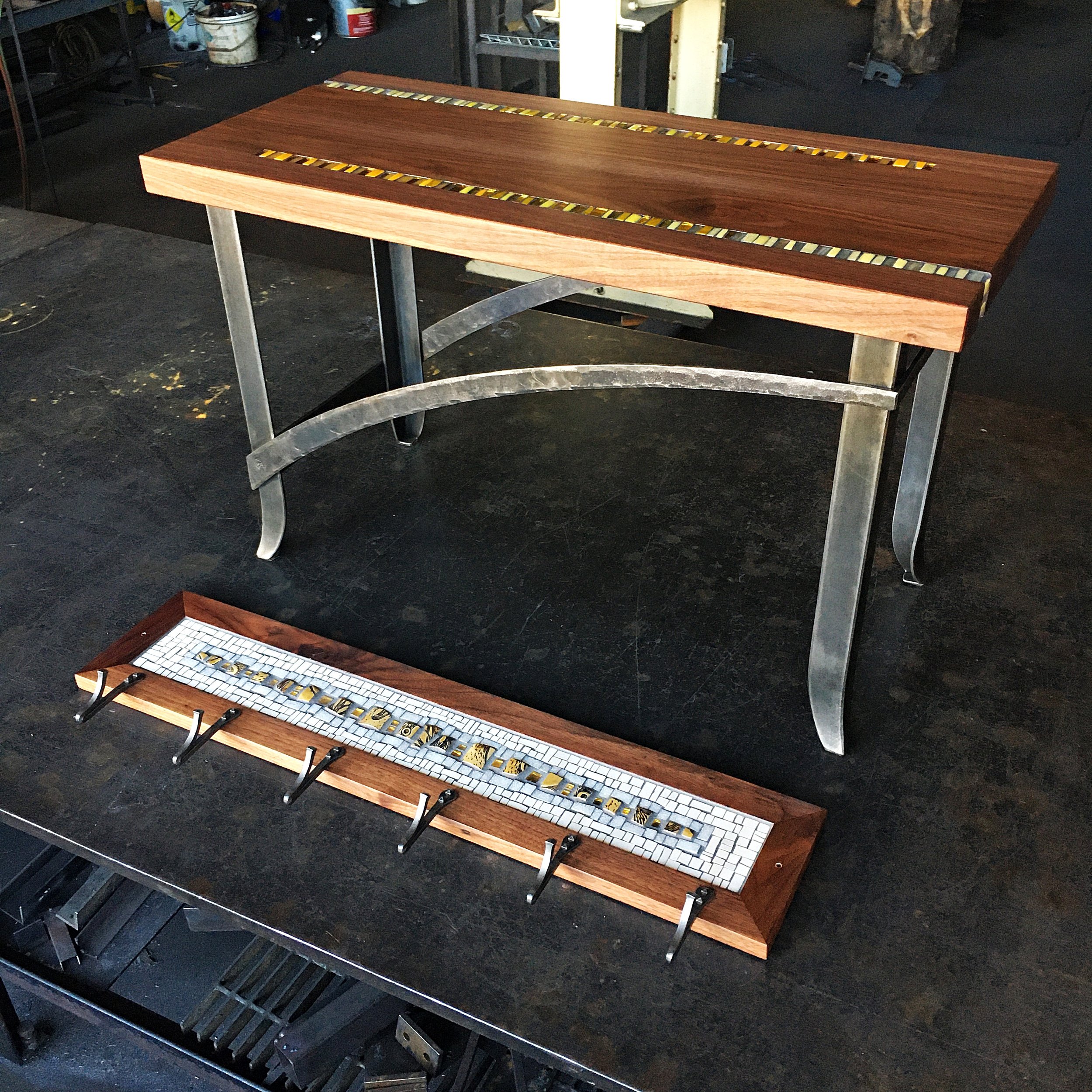 Coordinating custom bench and coat rack in forged steel, mosaic, and walnut