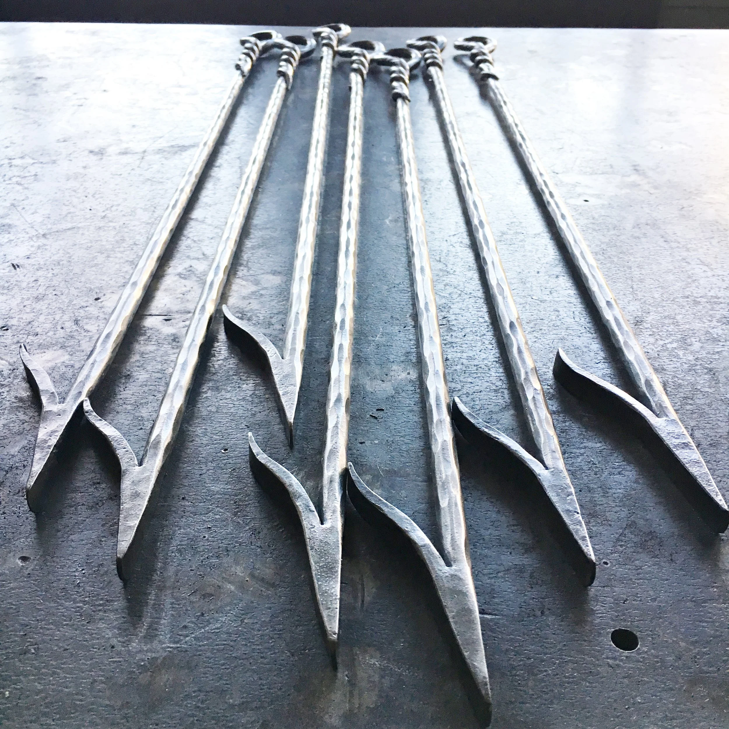 Group of hand-forged twisted handle bonfire pokers