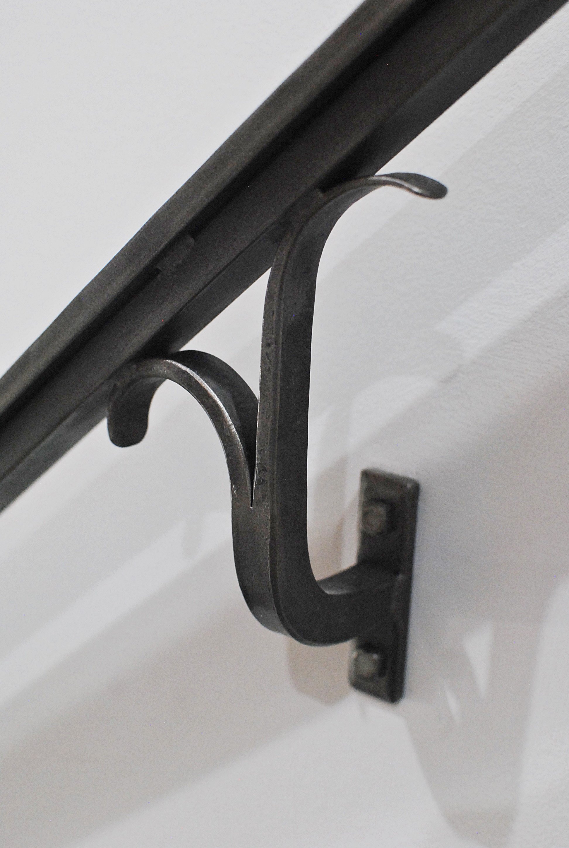 Stair bannister wall bracket detail