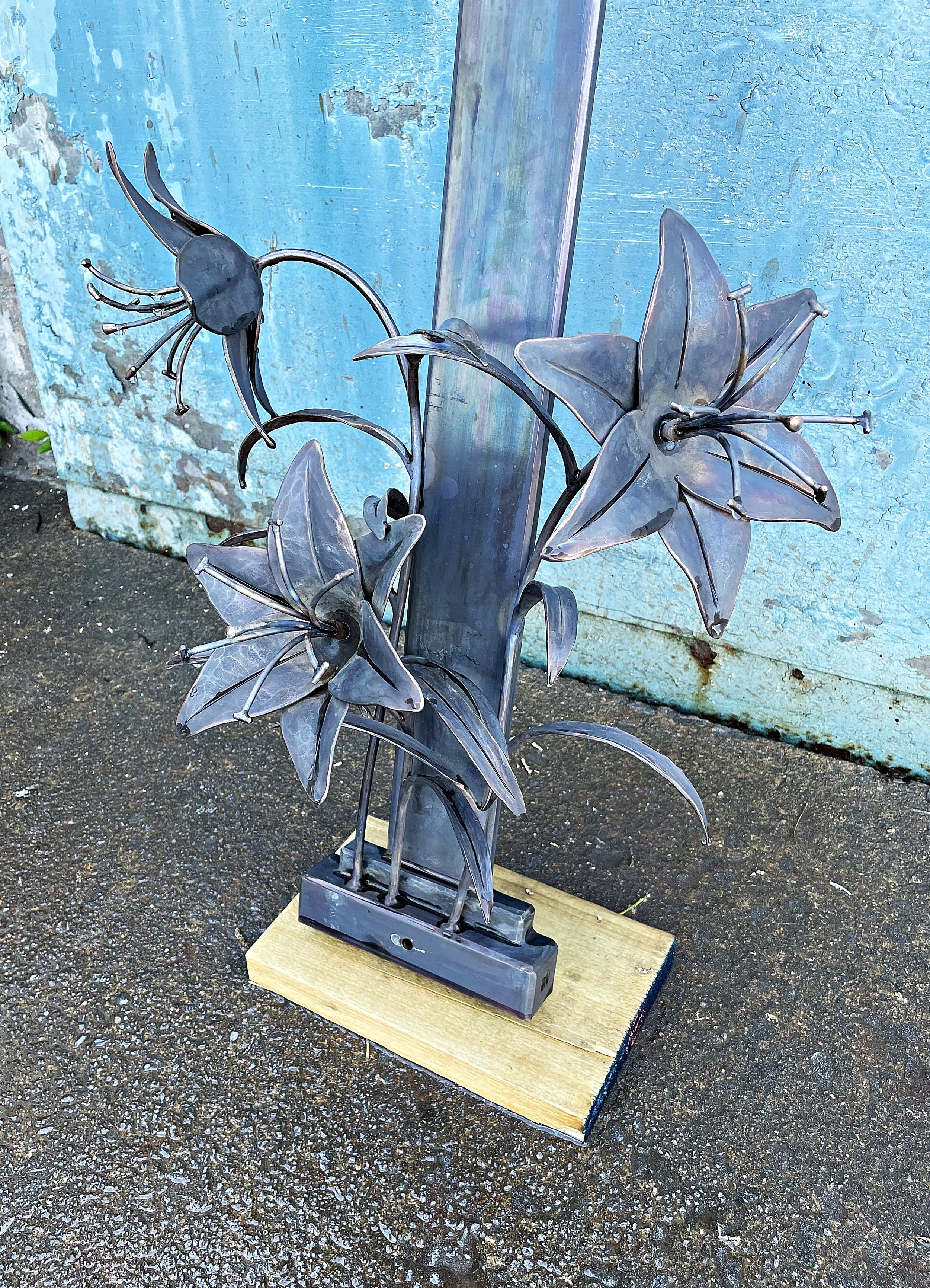 Detail of forged bronze lilies