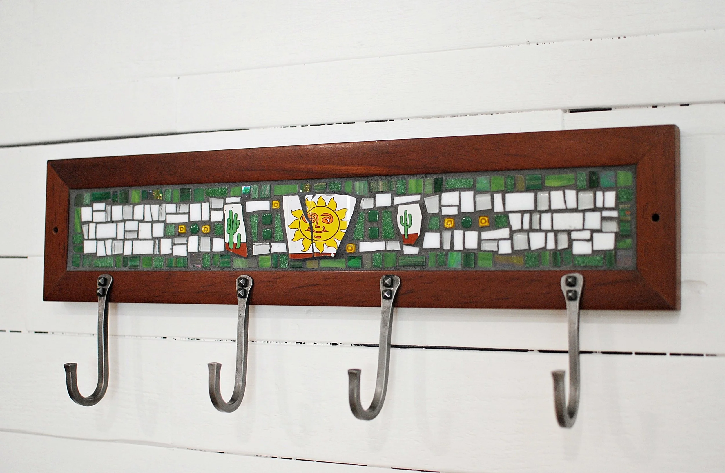 Green and White Mosaic with Yellow Sun