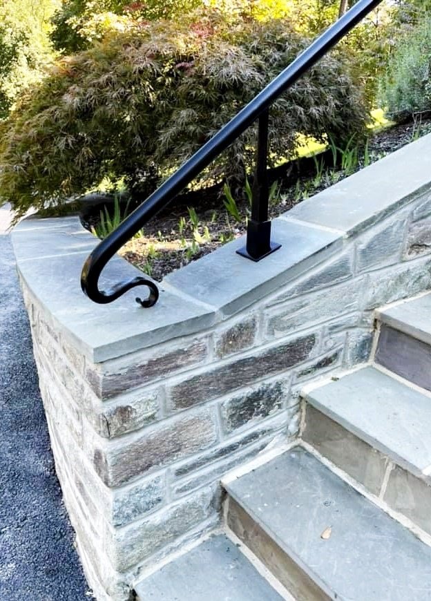 Hand forged custom exterior stair railing
