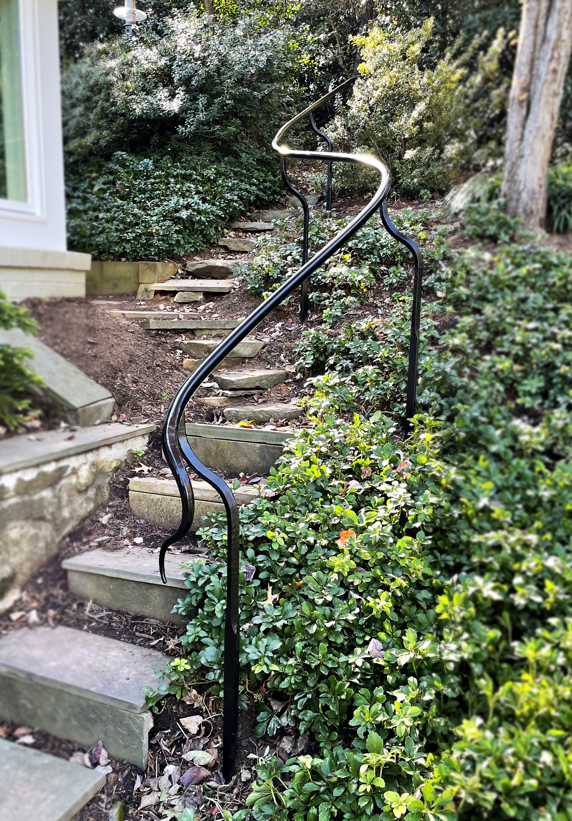 Hand forged custom exterior stair railing