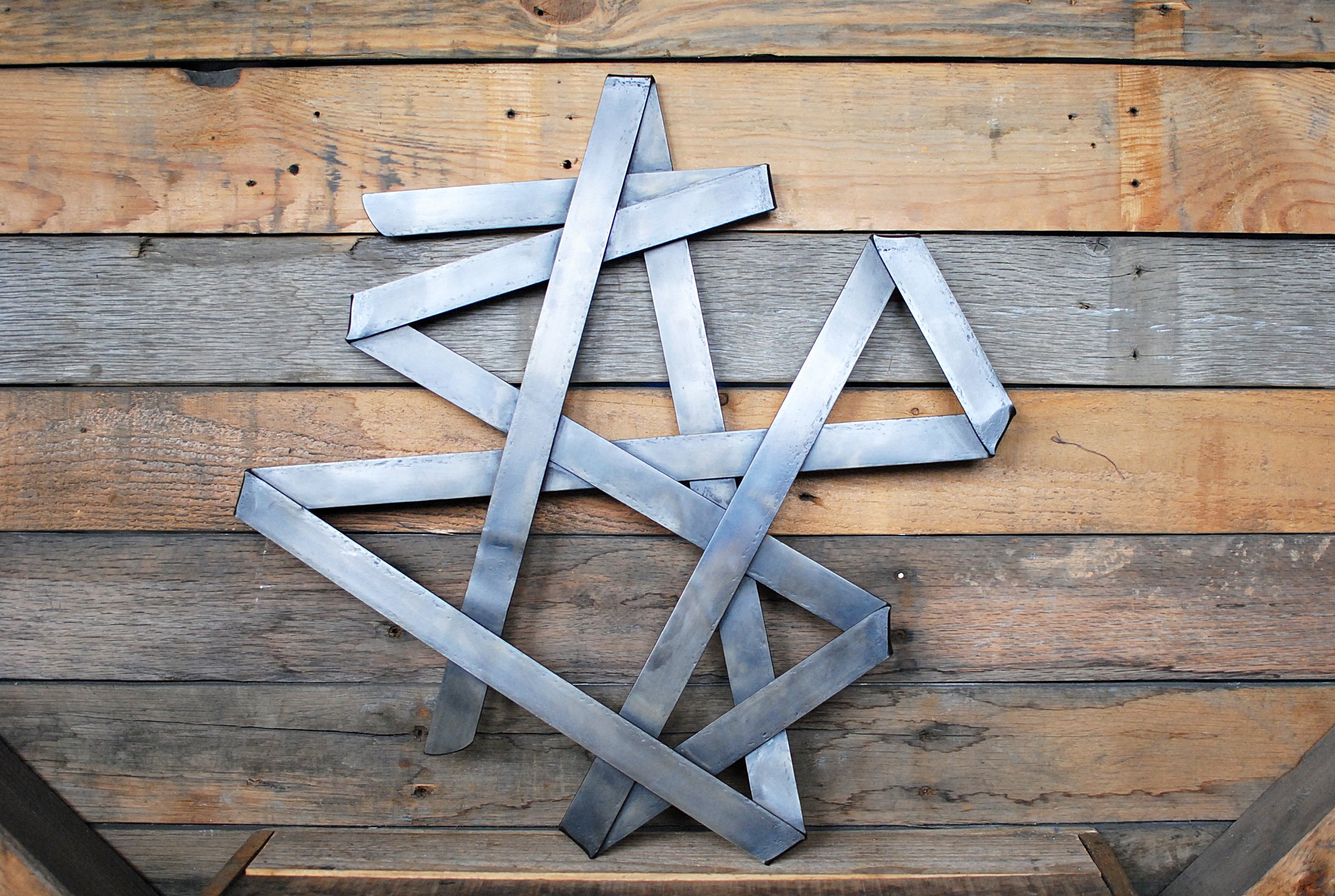 Contemporary steel wall sculpture