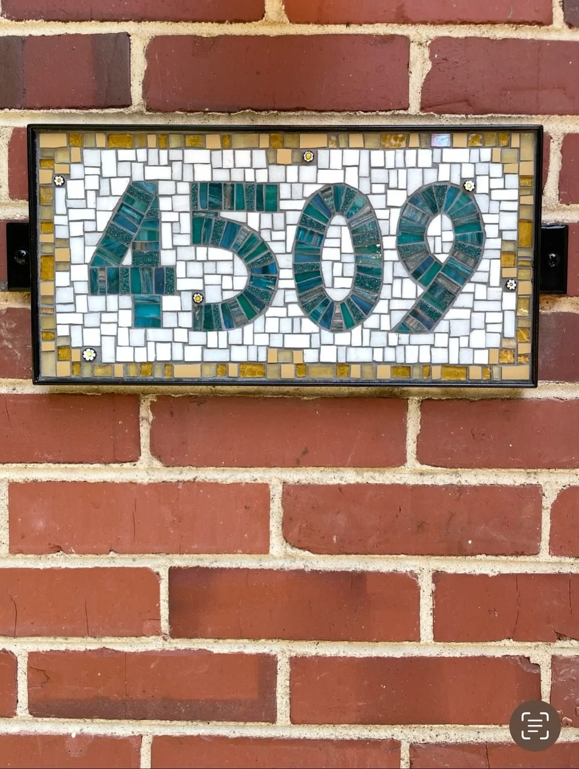 This mosaic address in the best color combination is just the beginning of some work we recently finished up for a lovely local client. 

Swipe through to see the design inspiration provided by her front door and a detail shot of the mosaic that show