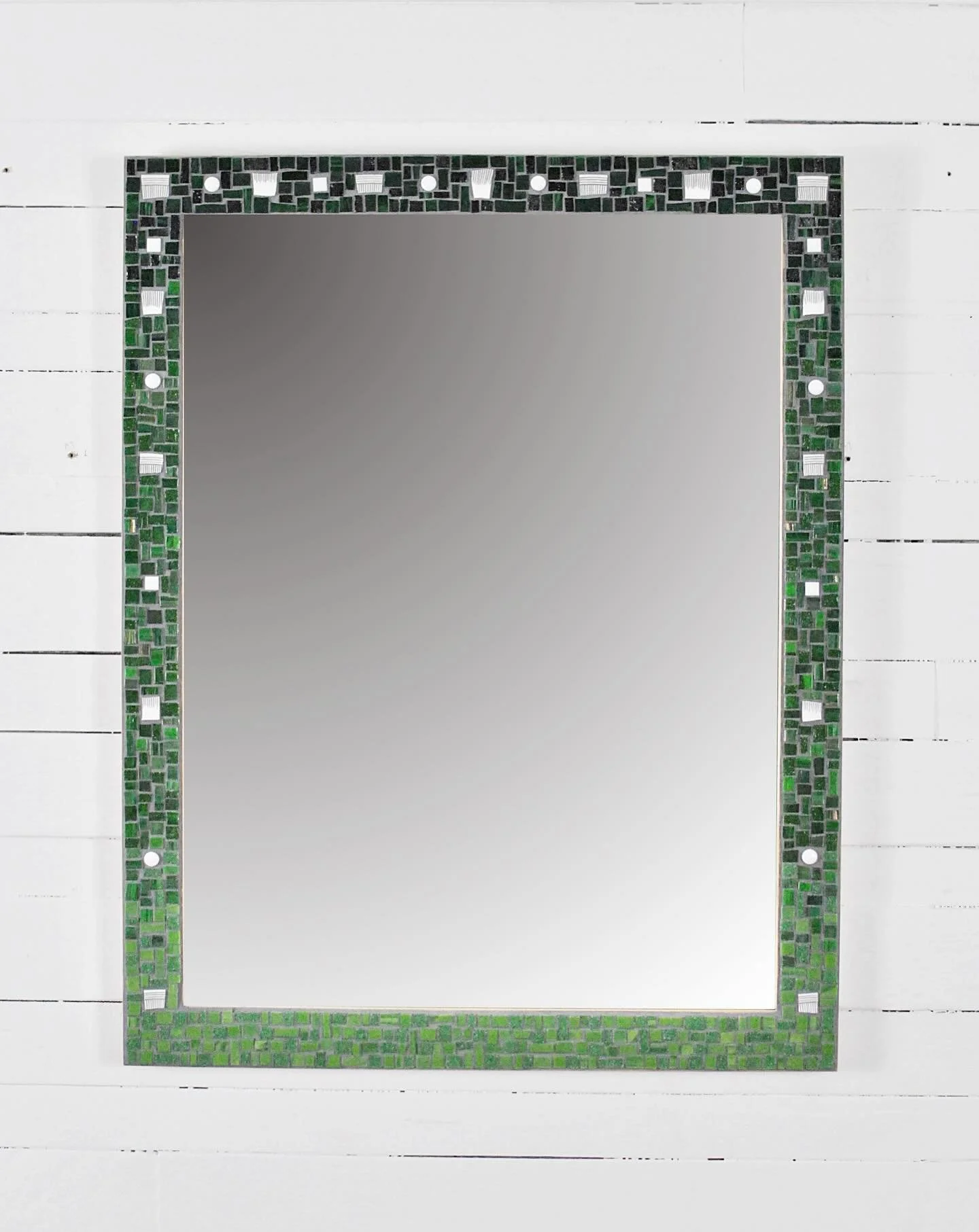 Finally found the time to get our latest mirrors up in the shops! This green and white mirror is just the first. 🪞

Inspired by a similar mirror in navy blue, this one fades from deep emerald at the top to bright spring green at the bottom. Reclaime