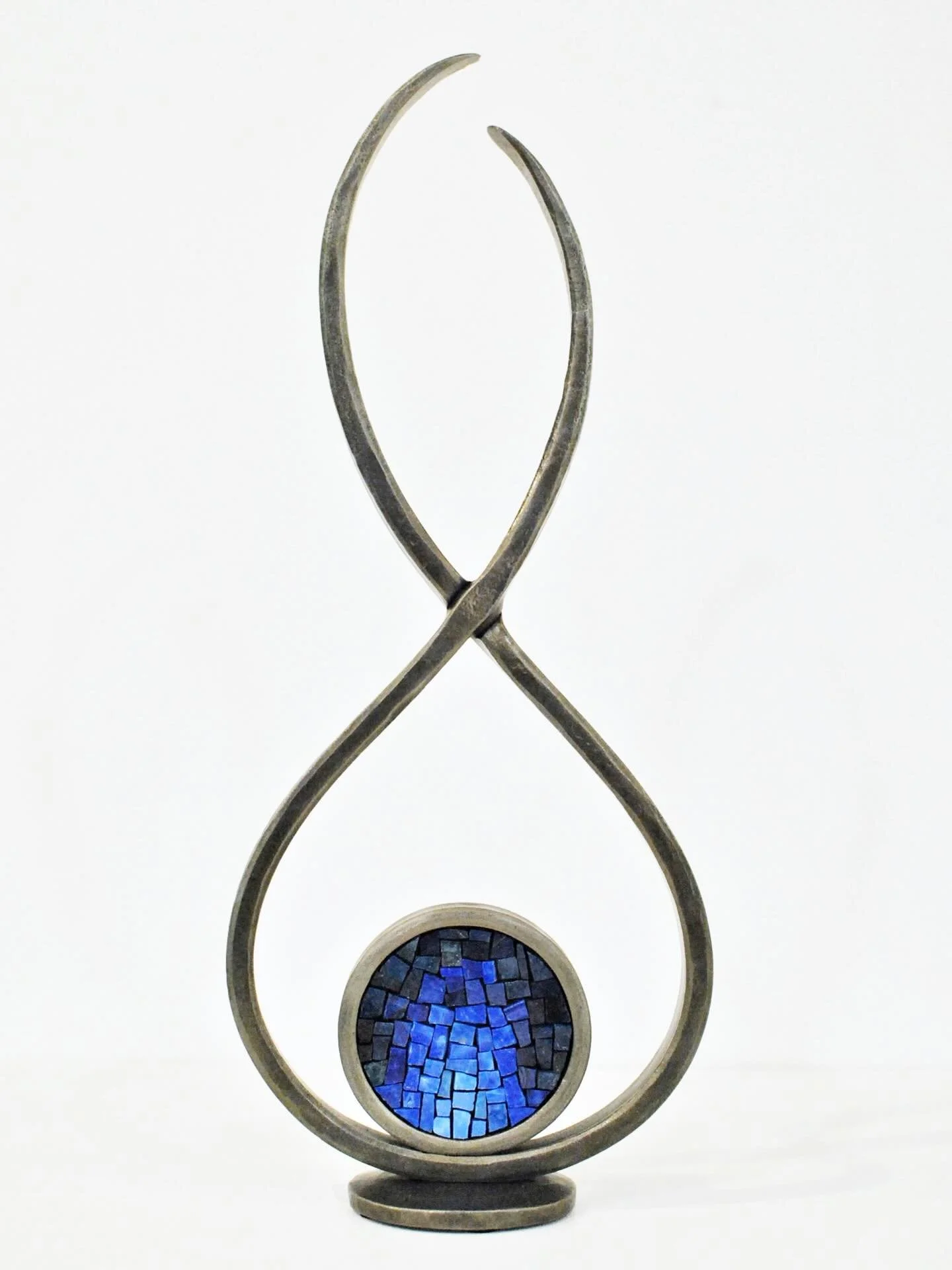 New sculptures photographed, weighed, described in detail, and listed in our shops. 🧞&zwj;♂️

The cornflower blues in this one are inspired by the colors of a blue flame. And don&rsquo;t miss that forged half-lap connection in the steel! ✨🔷

Find t