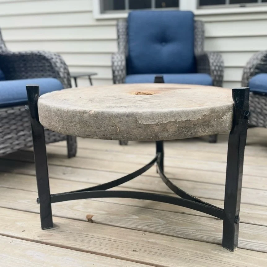 New outdoor coffee table made from an old grinding stone with a forged steel base. 🔥⚒️