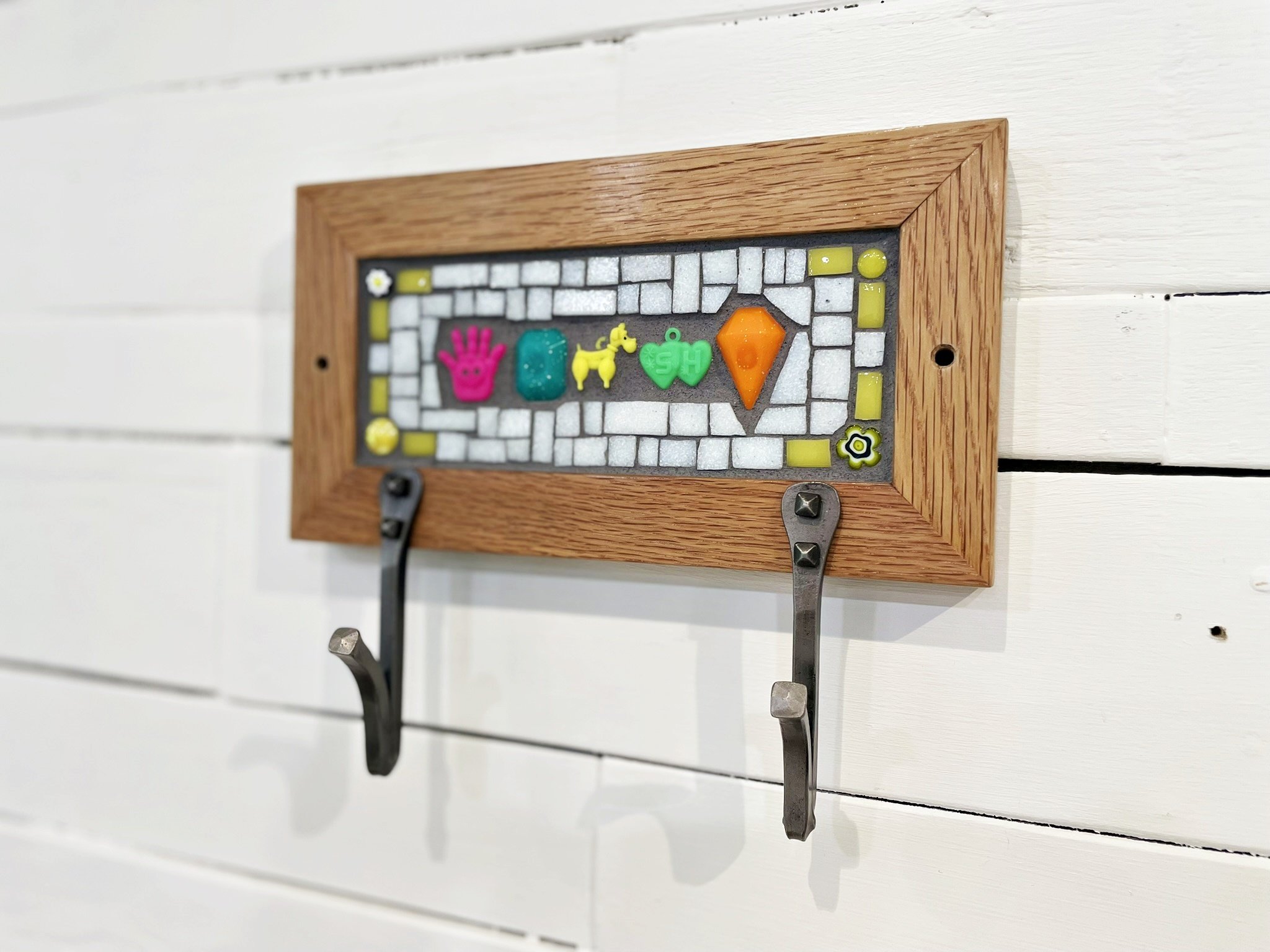 Small Mosaic Coat Rack with Bright Colored Toys
