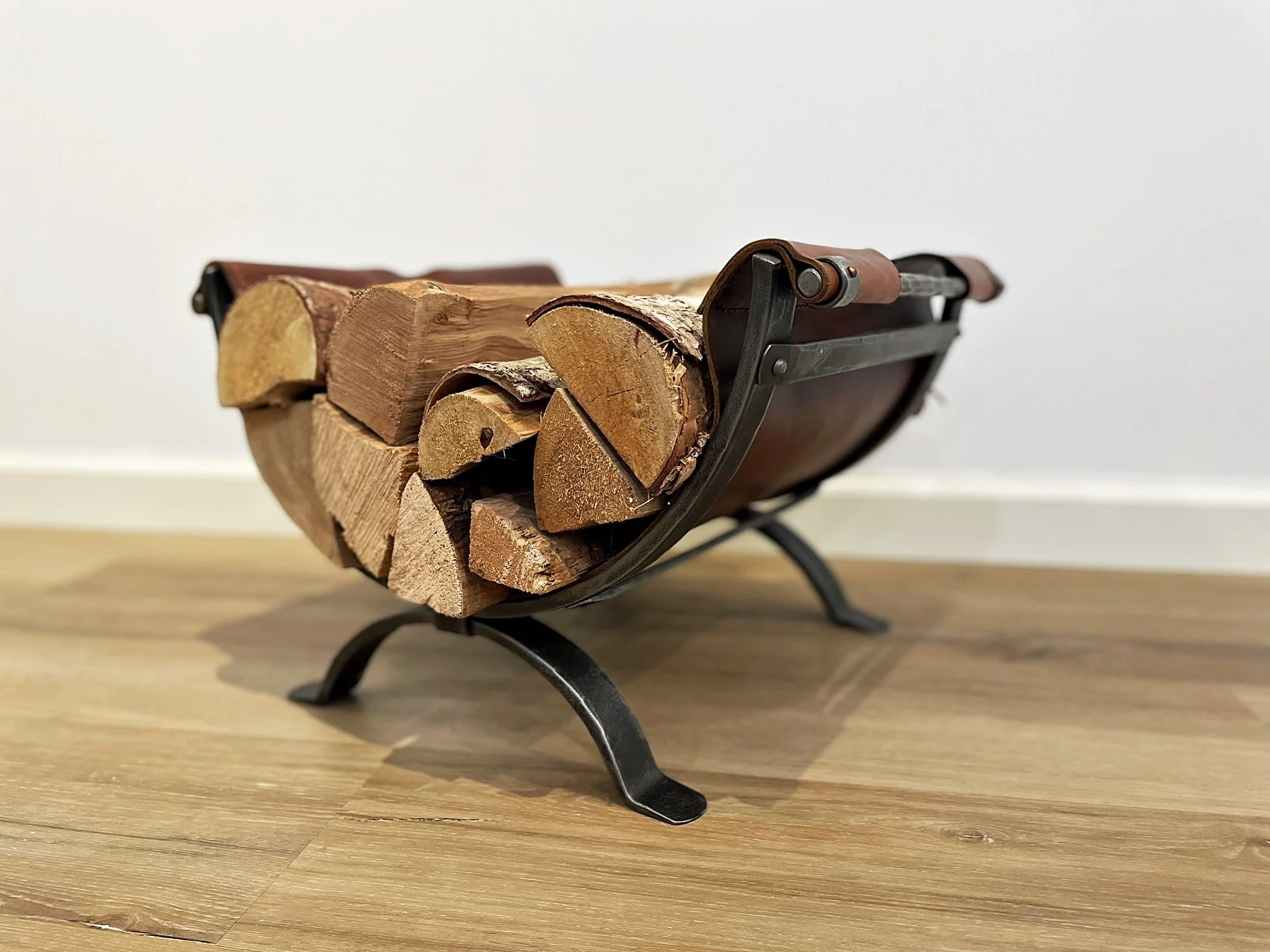 Steel and leather log holder PH + AS (1).JPEG