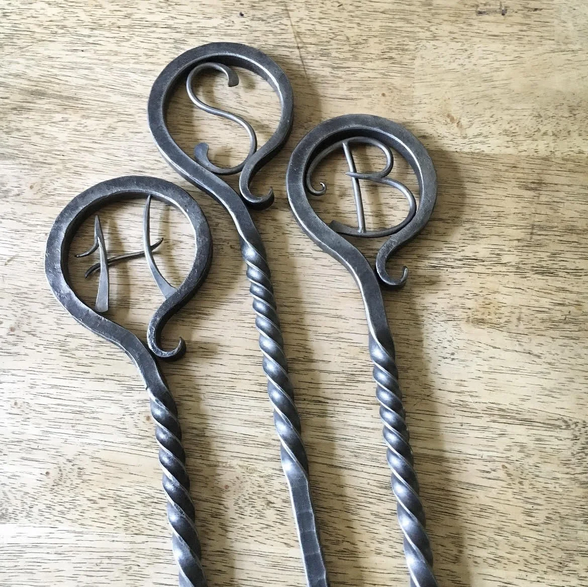 Fireplace tools with monograms.jpg