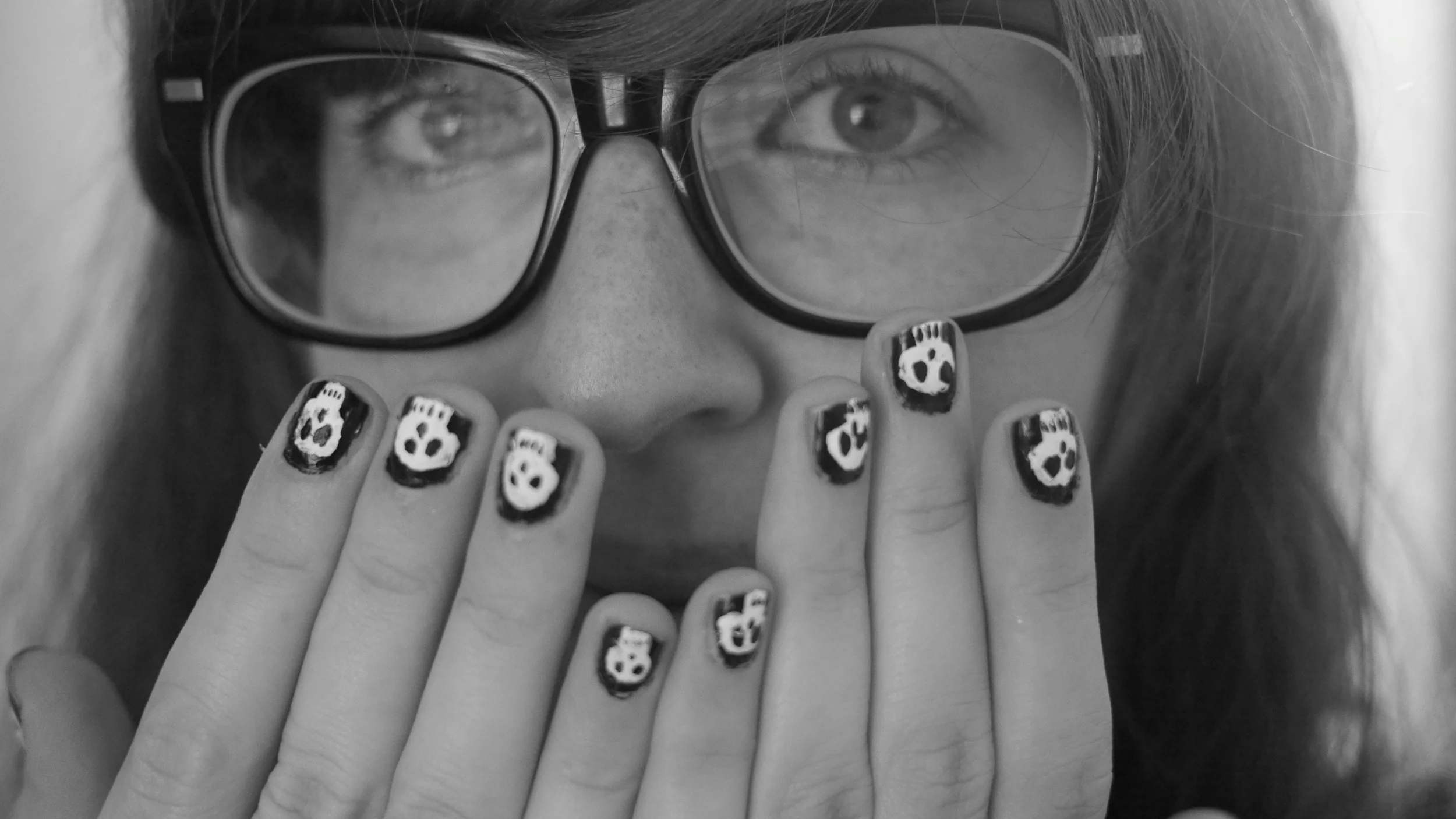 Nate painted these lil skulls on my nails! his new talent is a very exciting discovery for me...!